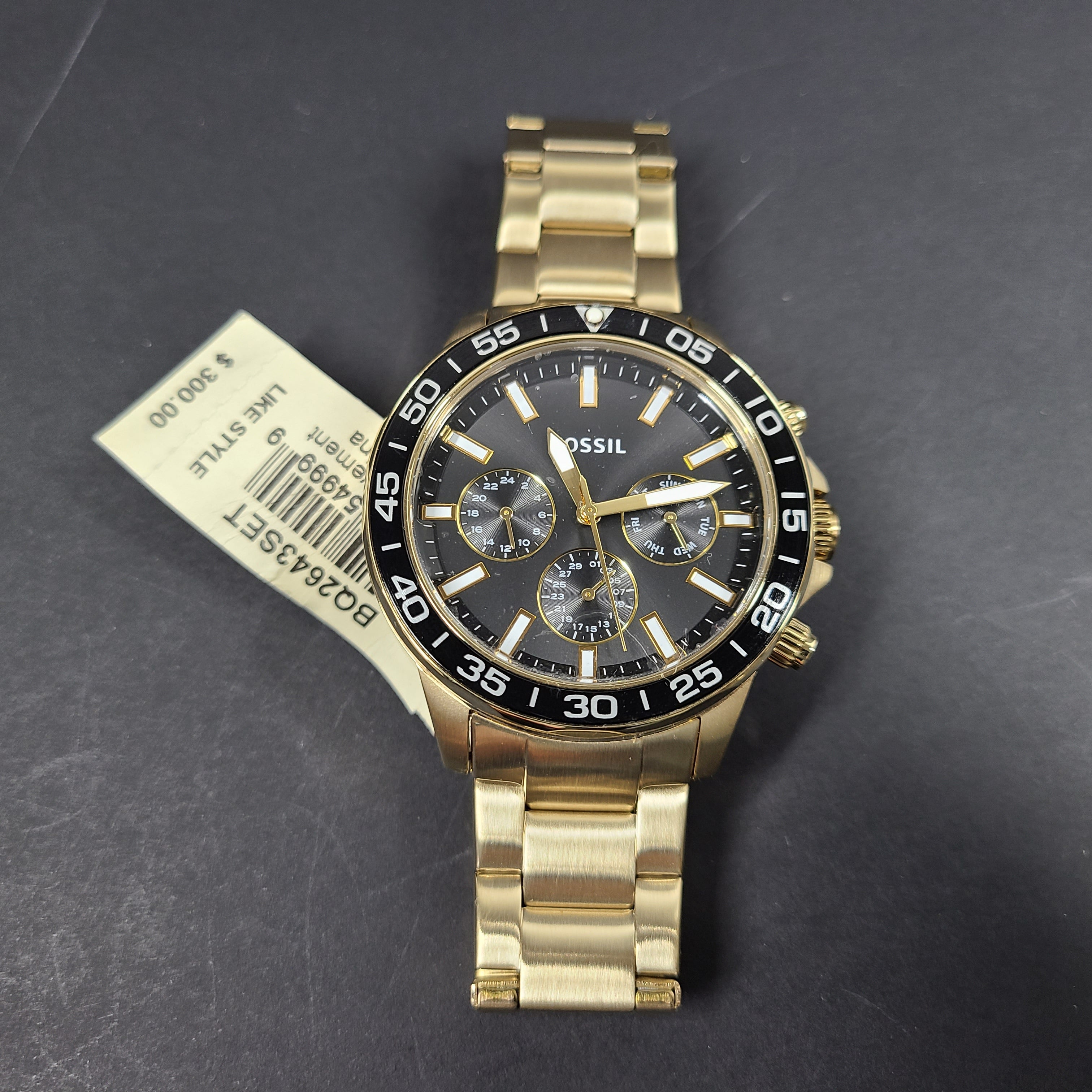 Gold stainless steel Fossil BQ2643MSET wristwatch with bracelet and Japan movement.
