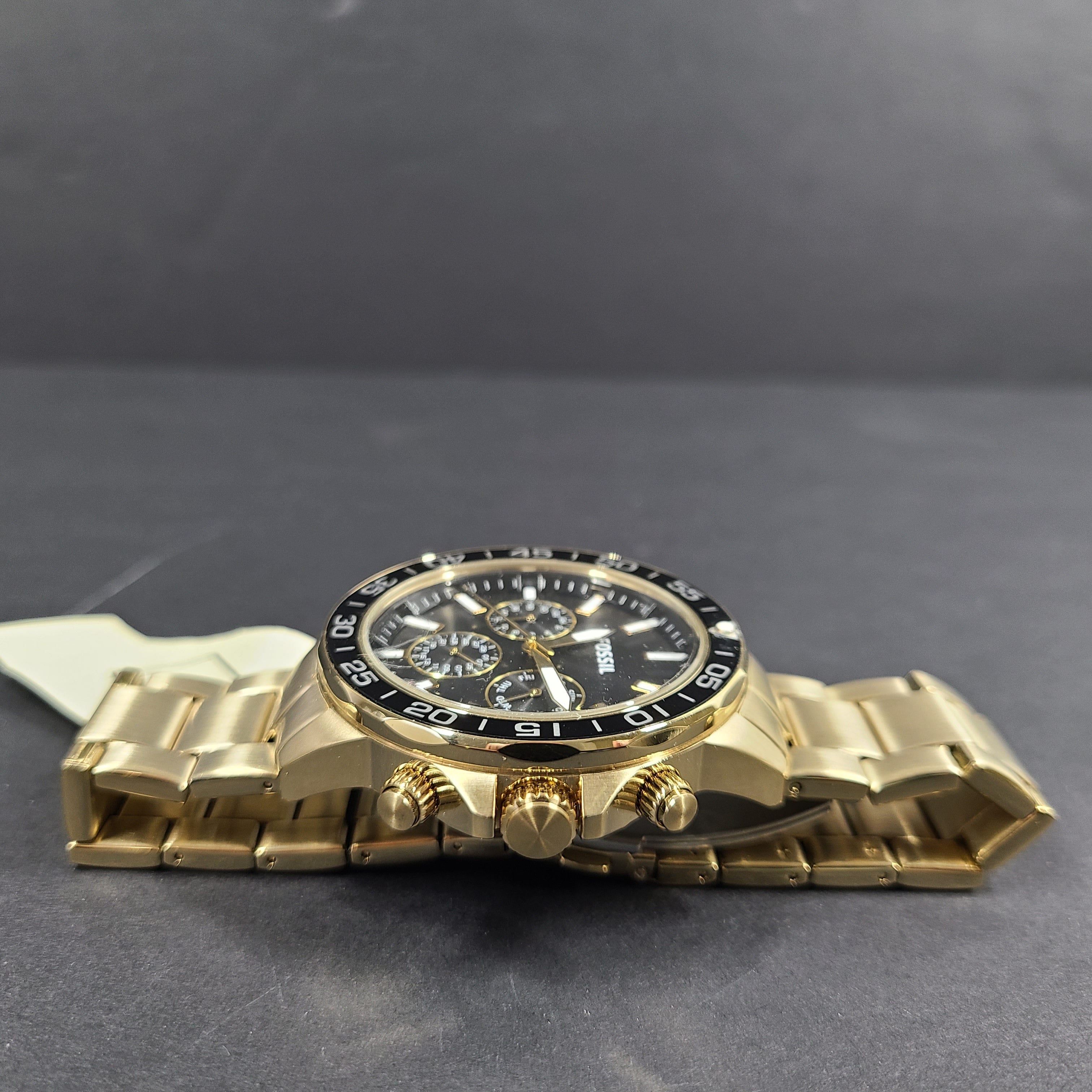 Gold stainless steel Fossil BQ2643MSET wristwatch with bracelet and Japan movement.
