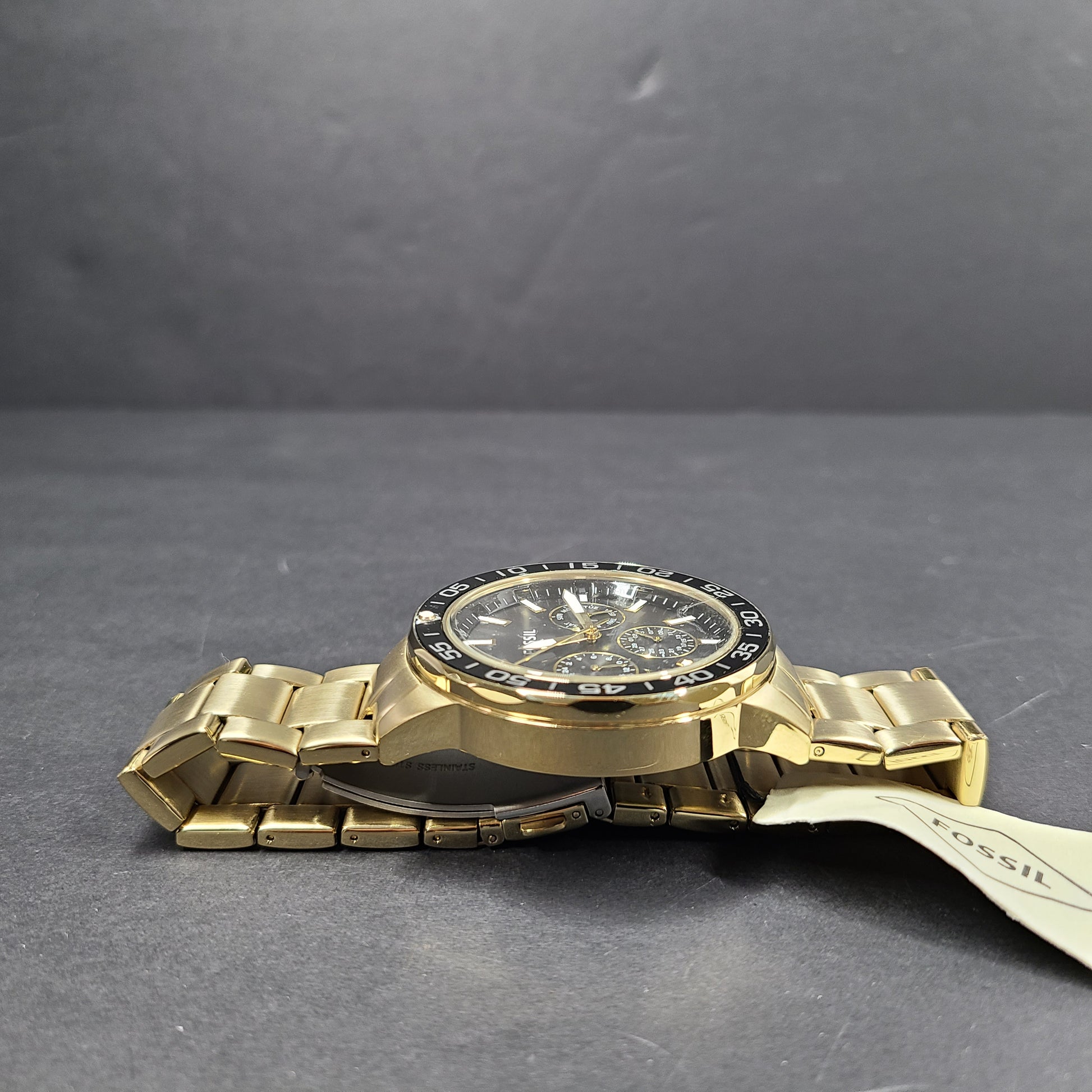 Gold stainless steel Fossil BQ2643MSET wristwatch with bracelet and Japan movement.