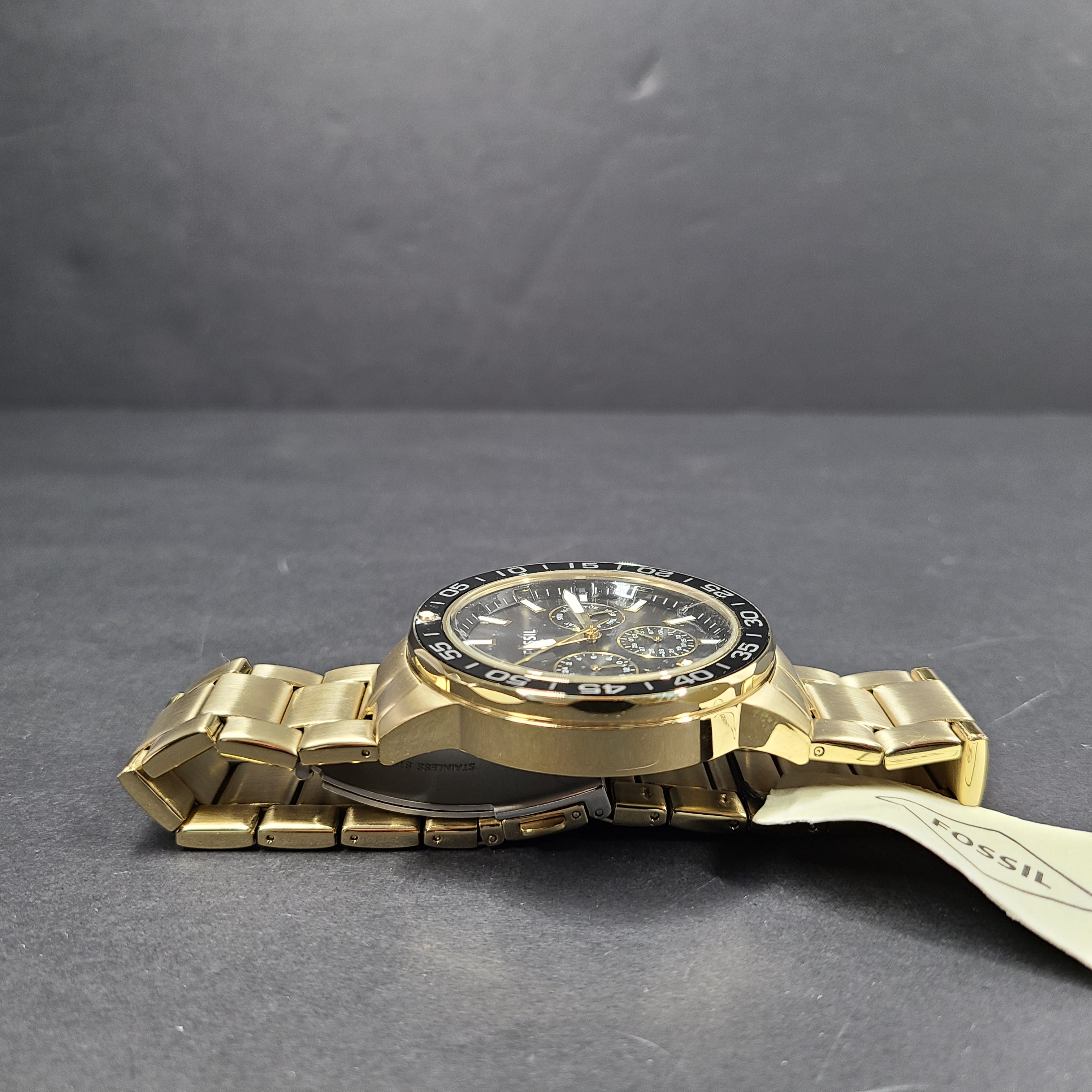 Gold stainless steel Fossil BQ2643MSET wristwatch with bracelet and Japan movement.