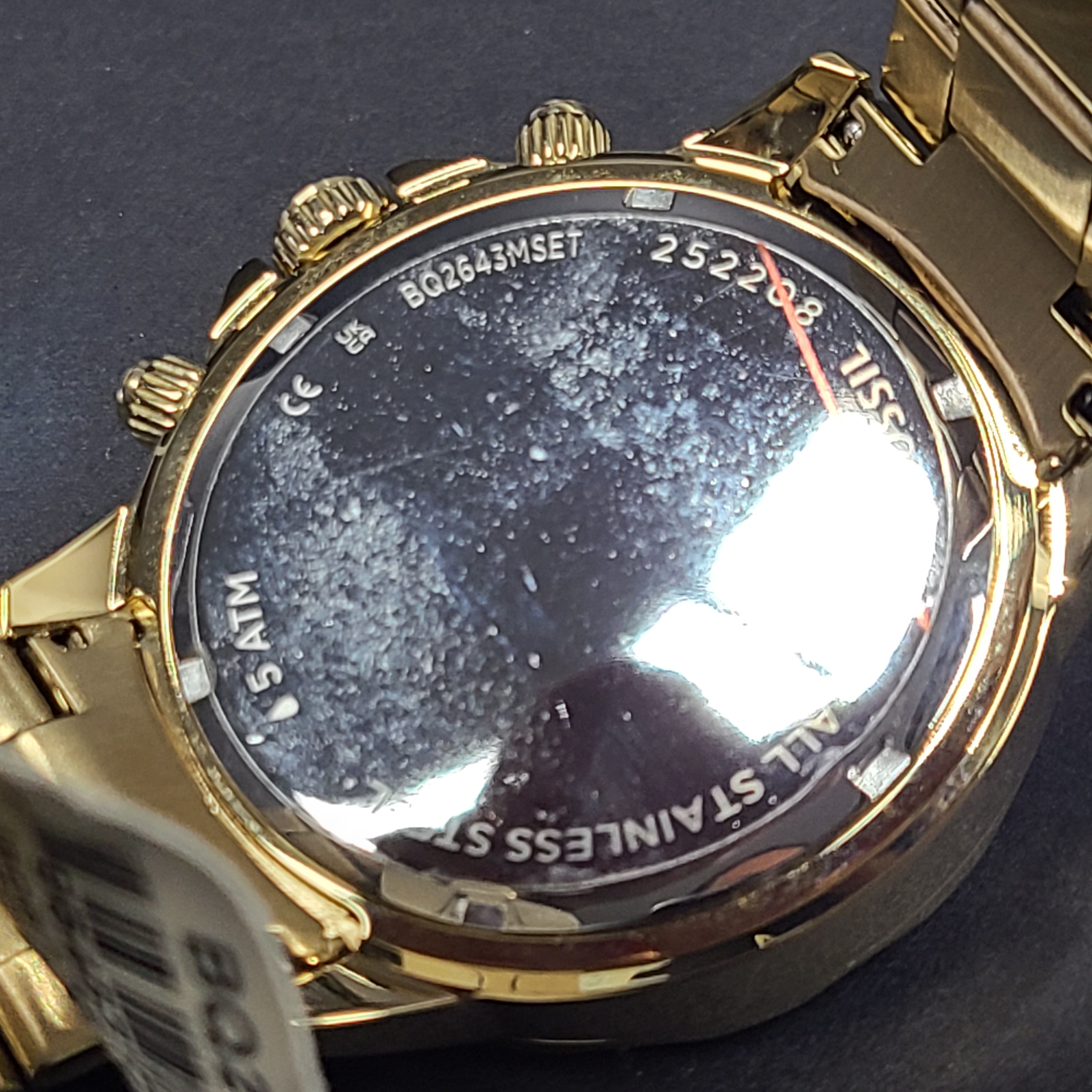 Gold stainless steel Fossil BQ2643MSET wristwatch with bracelet and Japan movement.