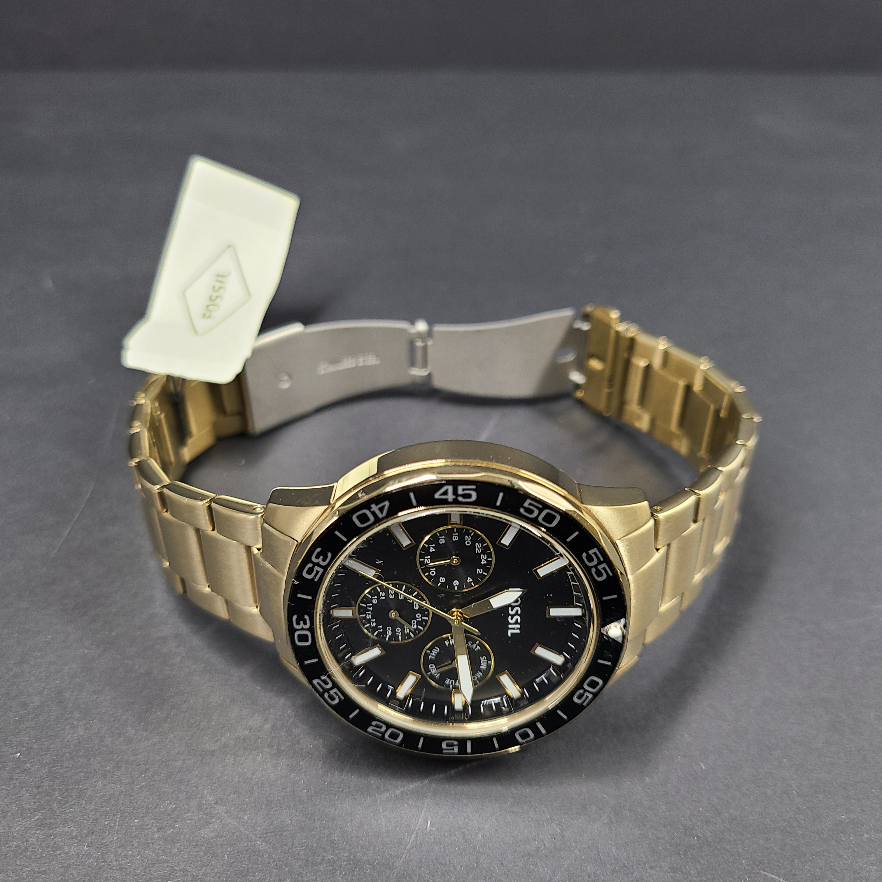 Gold stainless steel Fossil BQ2643MSET wristwatch with bracelet and Japan movement.
