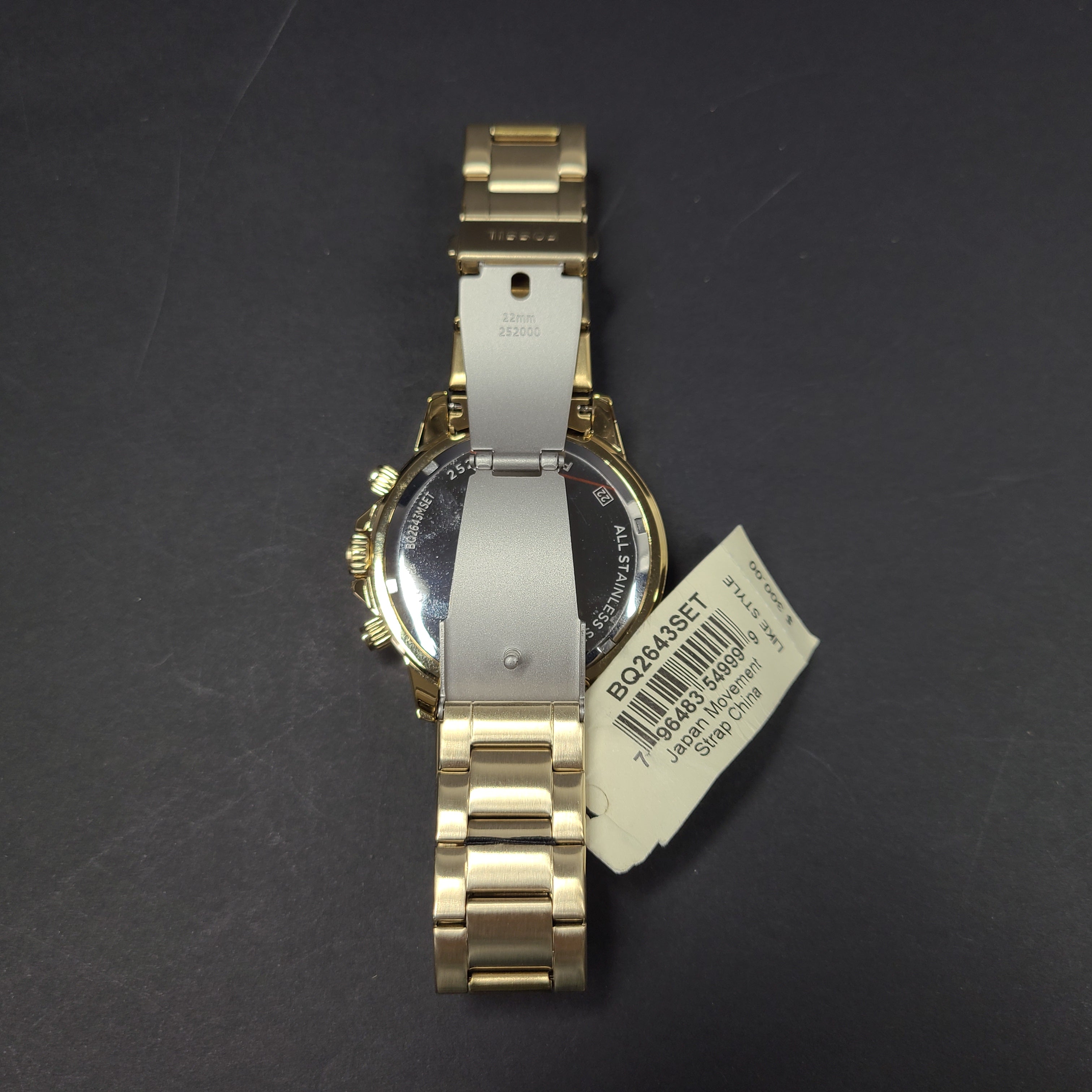 Gold stainless steel Fossil BQ2643MSET wristwatch with bracelet and Japan movement.