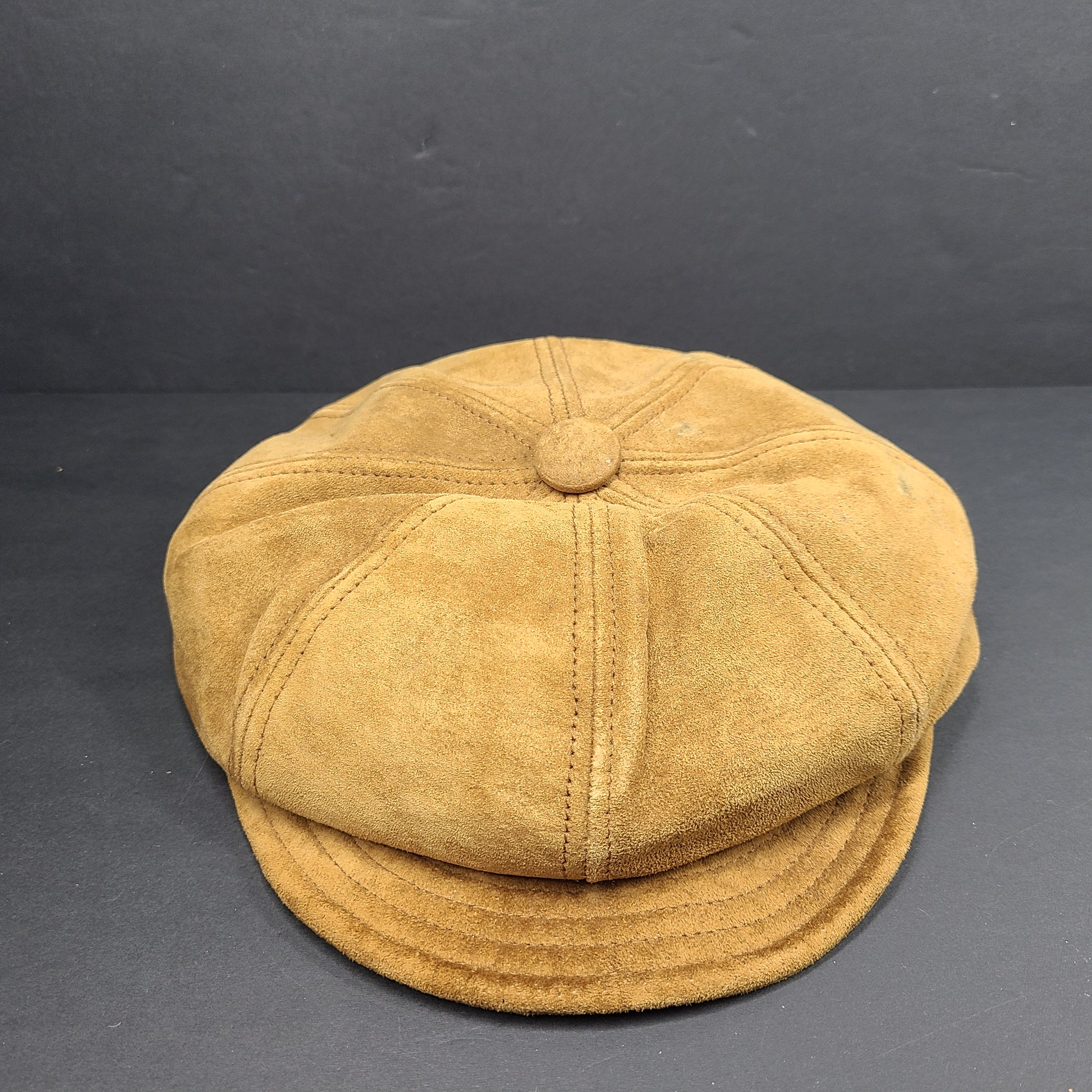 Goorin Bros medium brown suede cap with rounded crown and short brim.