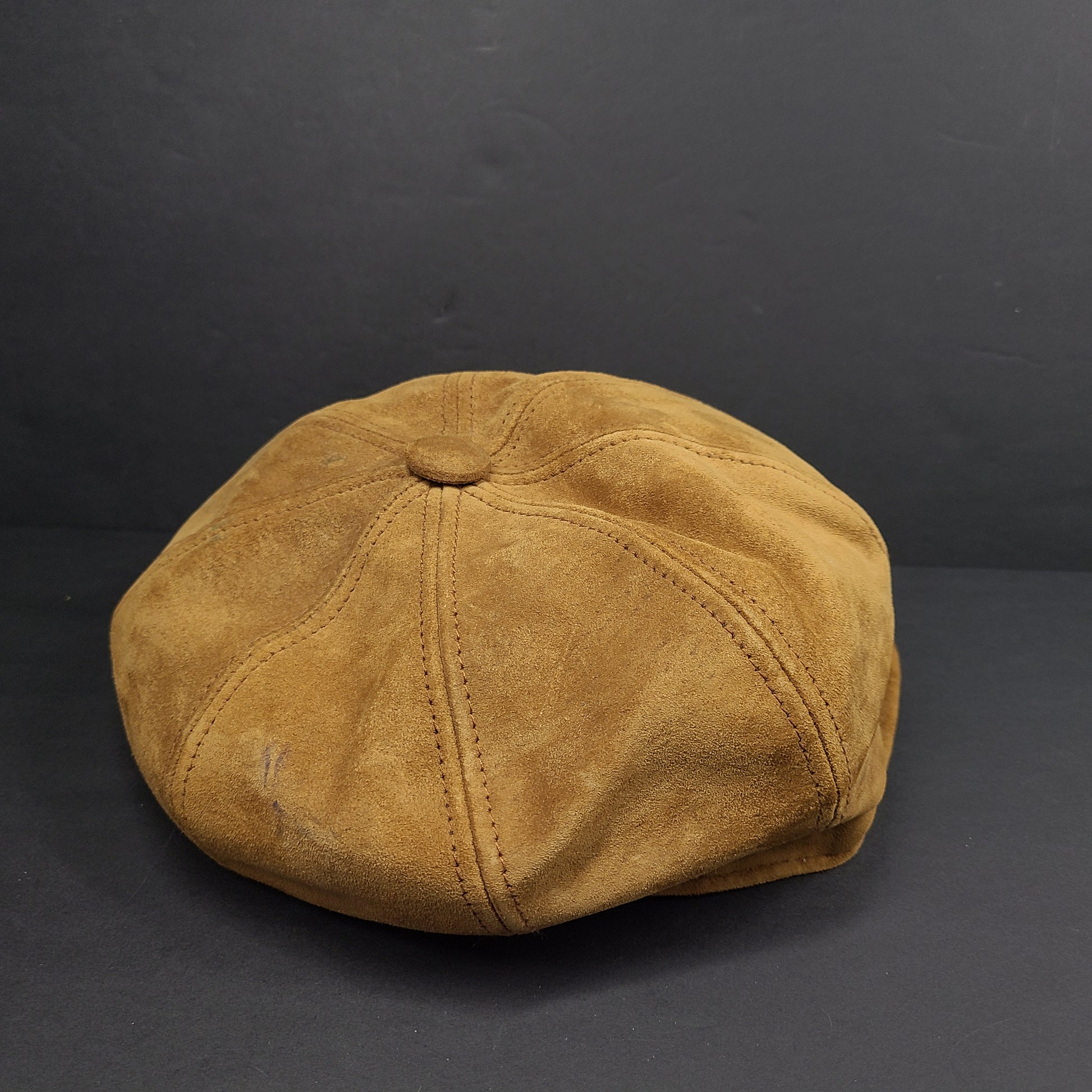 Goorin Bros medium brown suede cap with rounded crown and short brim.