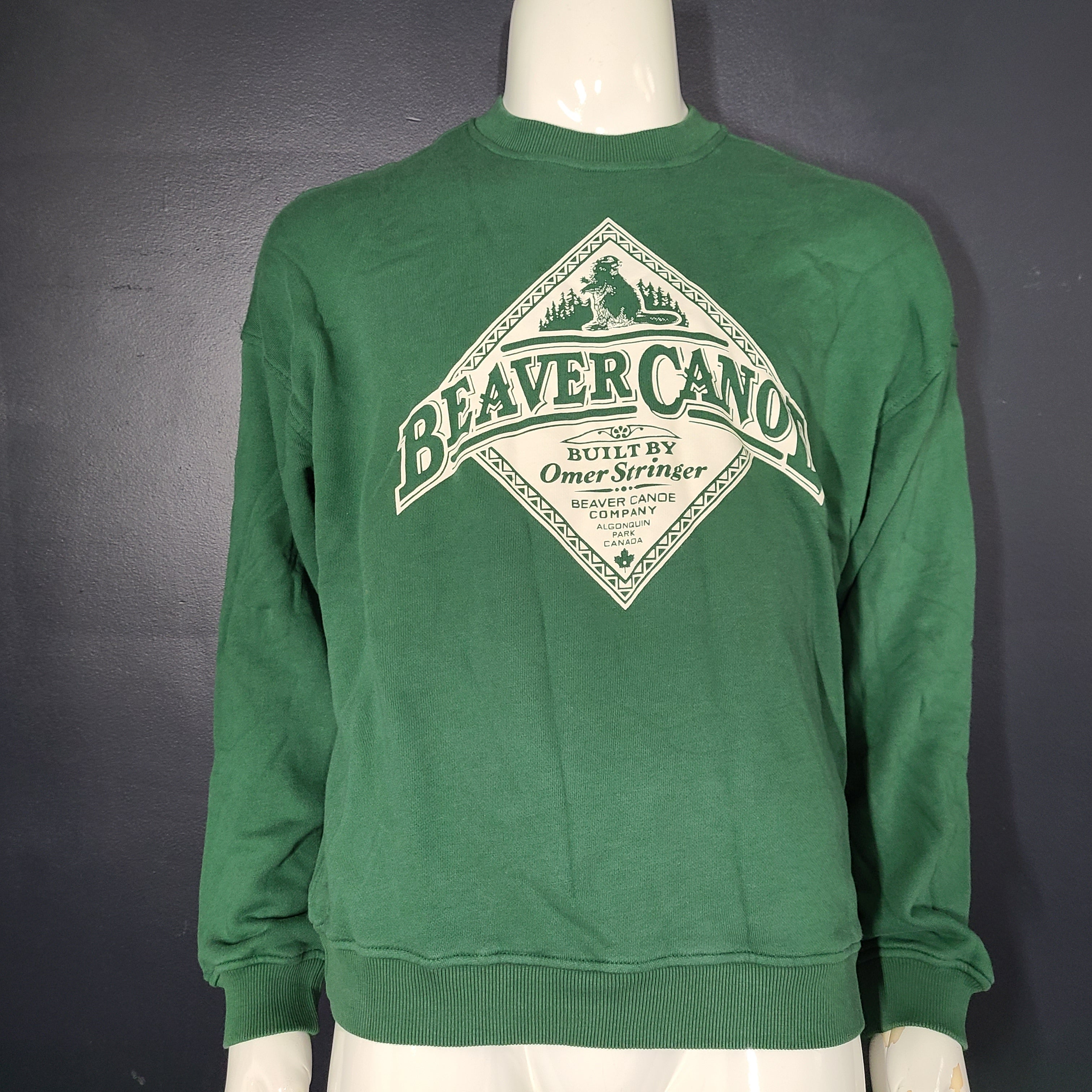 Roots Beaver Canoe Relaxed Crew Sweatshirt in forest green, size XS, with a relaxed crew fit and organic cotton construction.