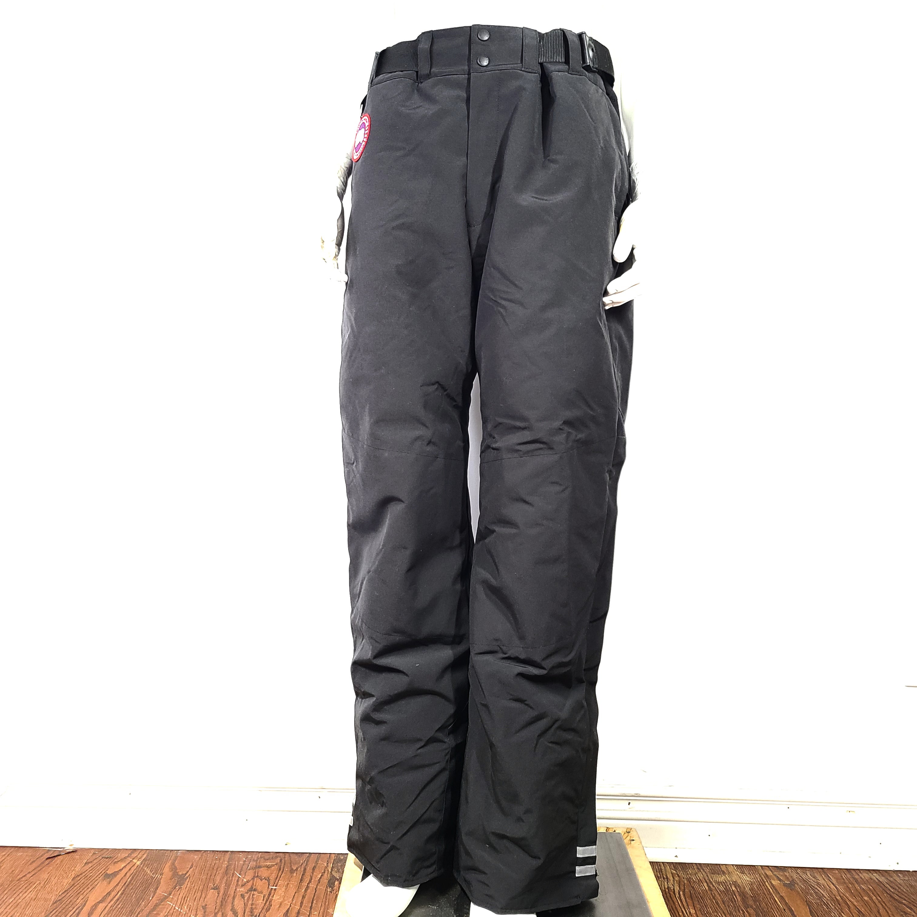 Black Canada Goose Arctic Program pants in large size with reinforced construction for cold conditions.