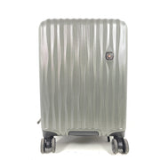 Swiss Gear silver hardside suitcase with embossed logo and light scuffs from regular use.