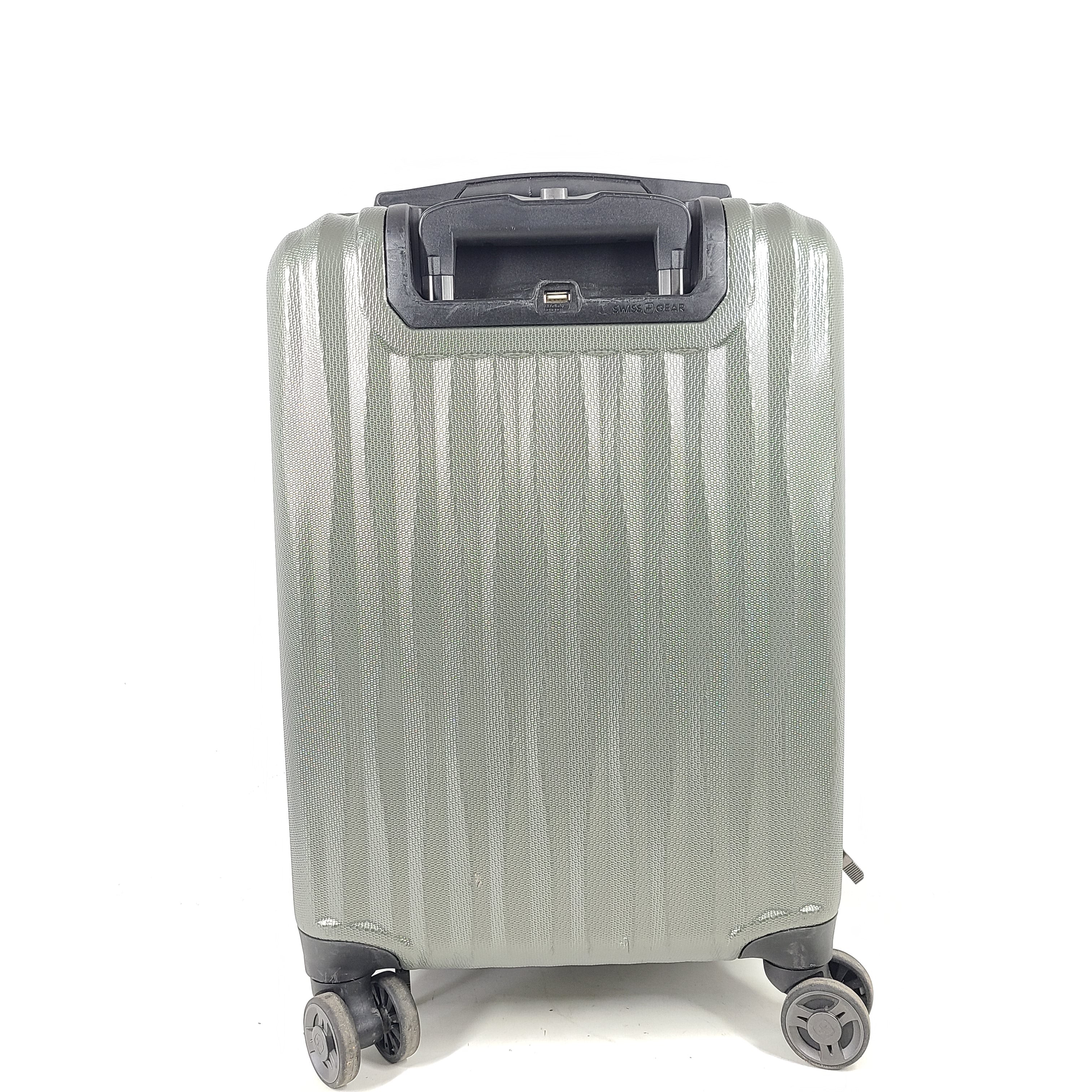 Swiss Gear silver hardside suitcase with embossed logo and light scuffs from regular use.