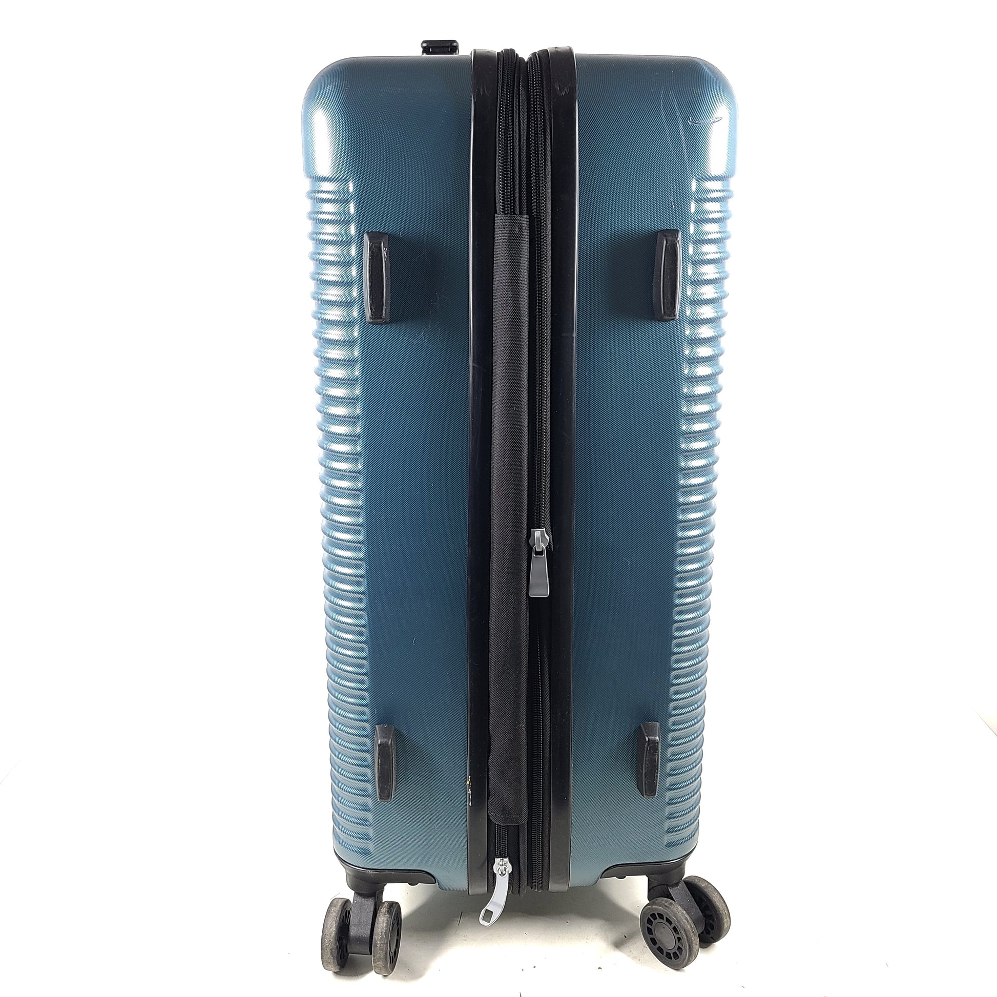 Samsonite blue hard-shell spinner luggage with front branding and a clean interior.