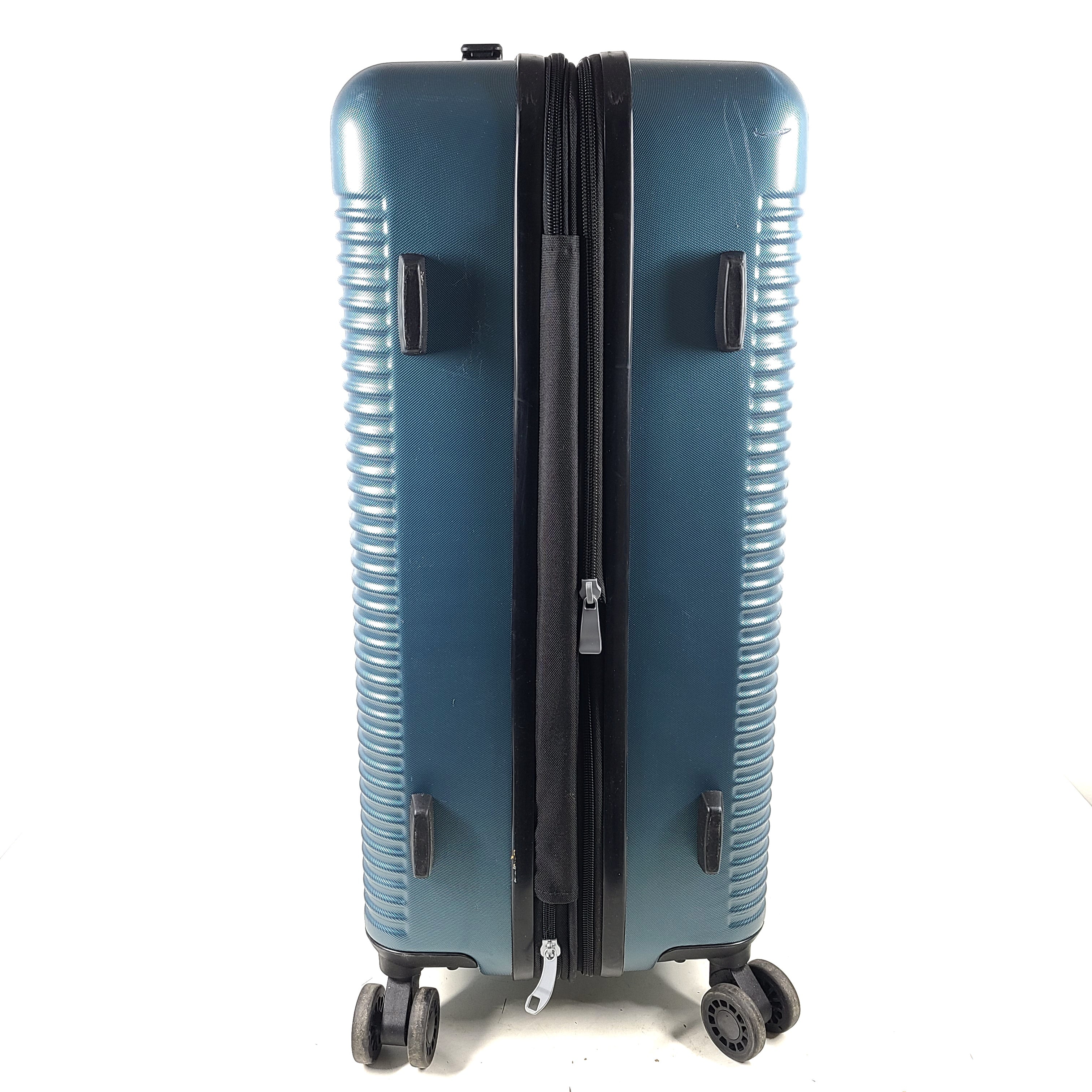 Samsonite blue hard-shell spinner luggage with front branding and a clean interior.