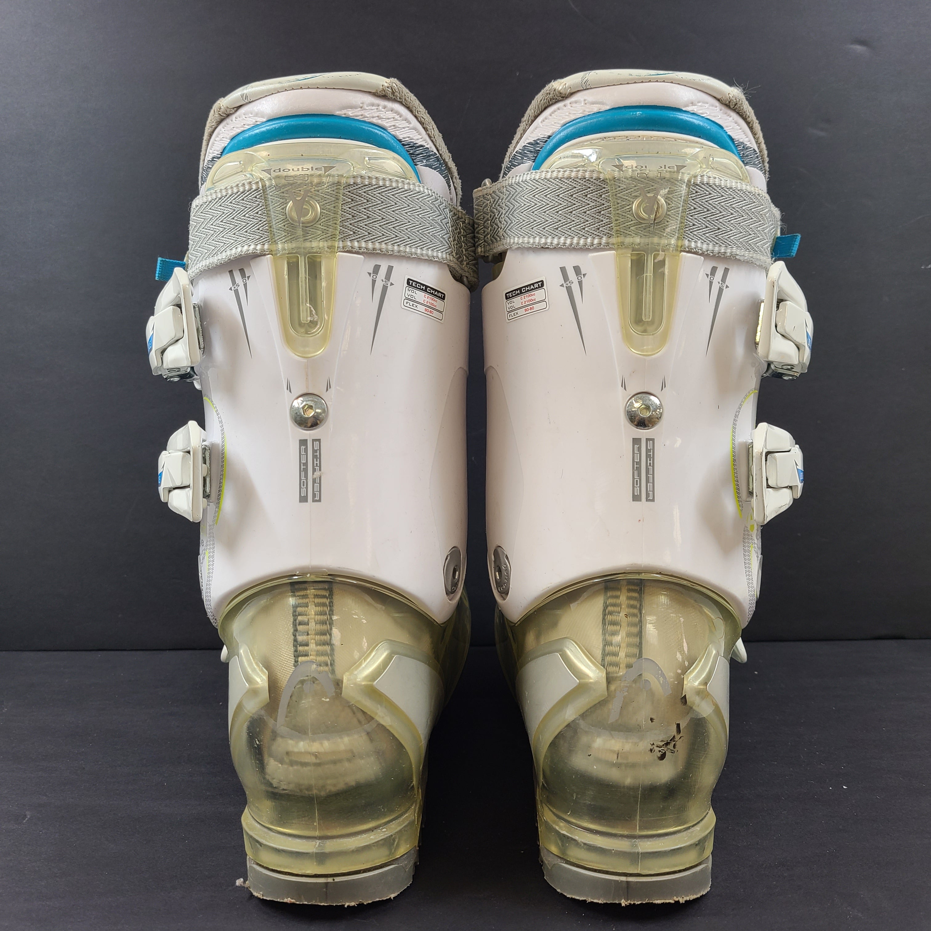 Pair of Head Adapt Edge 100 ski boots in transparent, white and blue with Energy Frame and Soft Walk heel for supportive alpine performance.