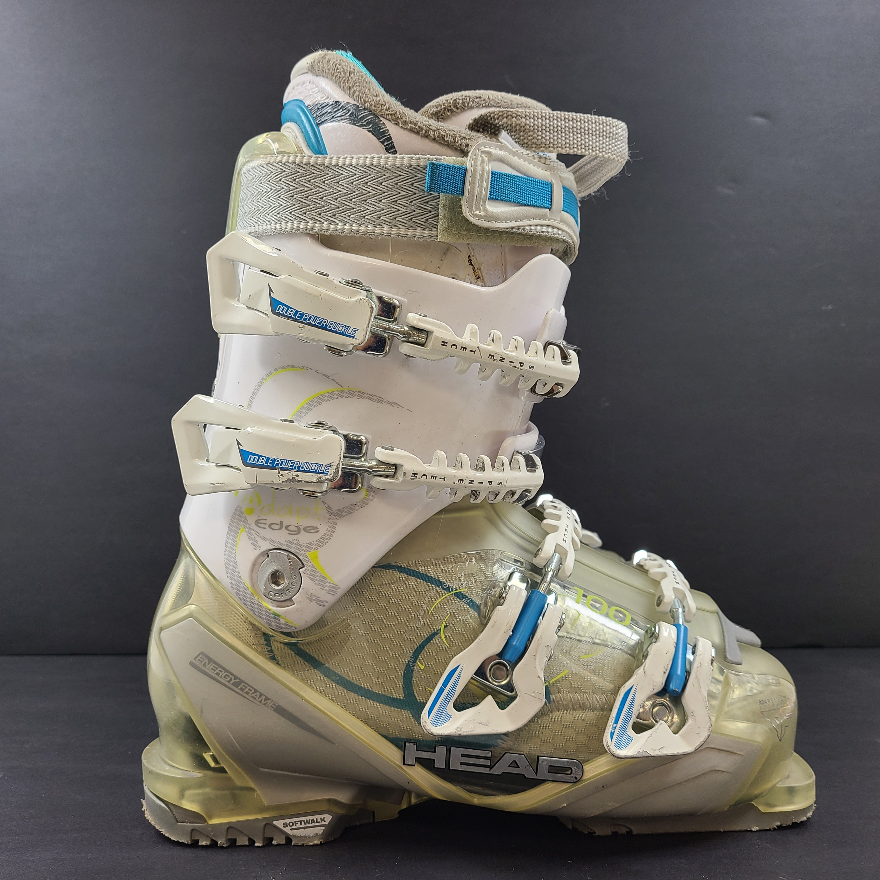 Pair of Head Adapt Edge 100 ski boots in transparent, white and blue with Energy Frame and Soft Walk heel for supportive alpine performance.