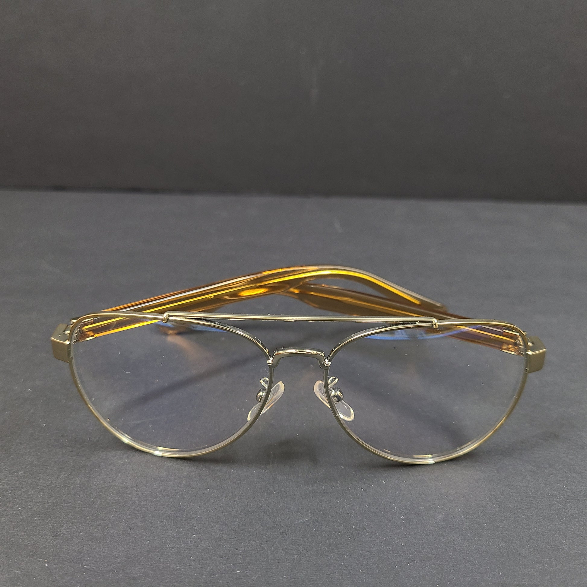 Tory Burch pilot-style metal-frame glasses in gold with 55mm eye size and branded temple detailing.