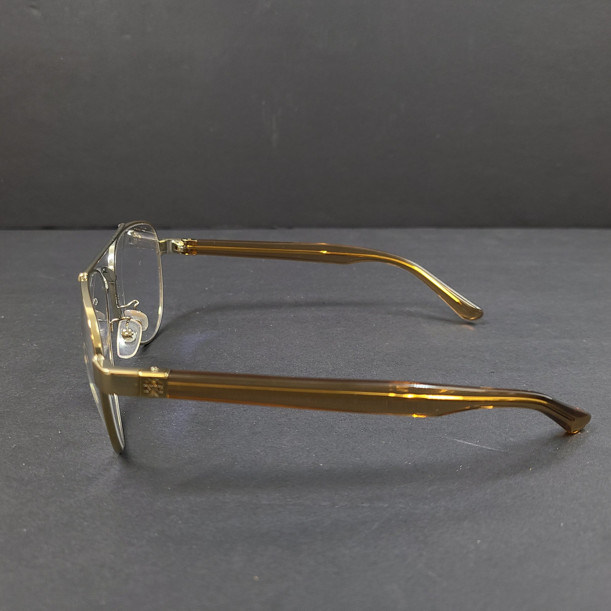 Tory Burch pilot-style metal-frame glasses in gold with 55mm eye size and branded temple detailing.