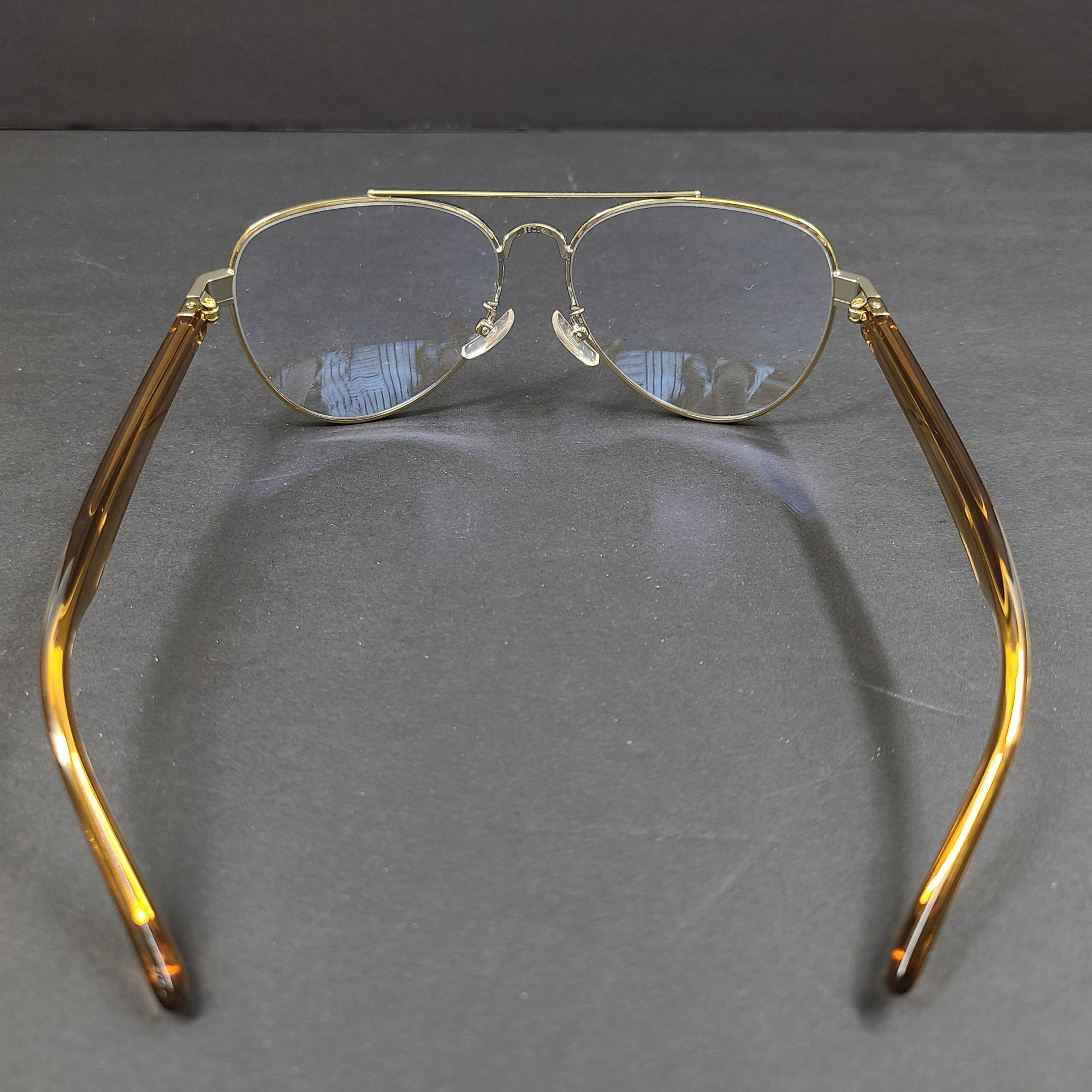 Tory Burch pilot-style metal-frame glasses in gold with 55mm eye size and branded temple detailing.