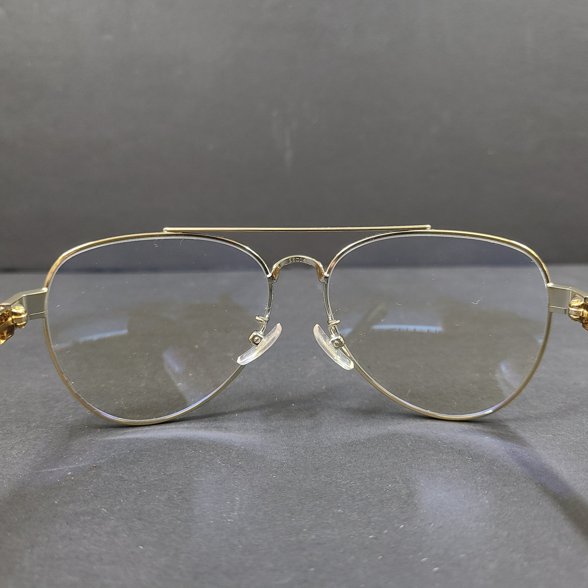Tory Burch pilot-style metal-frame glasses in gold with 55mm eye size and branded temple detailing.