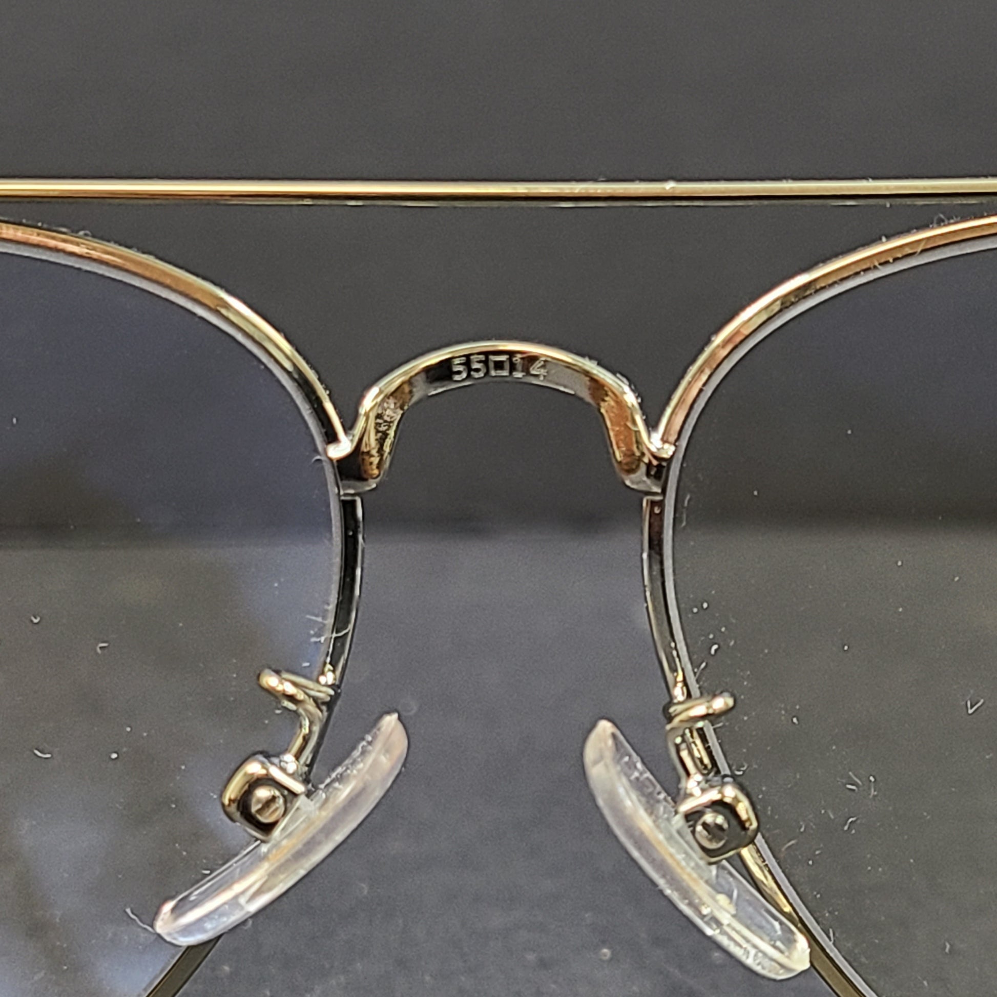 Tory Burch pilot-style metal-frame glasses in gold with 55mm eye size and branded temple detailing.