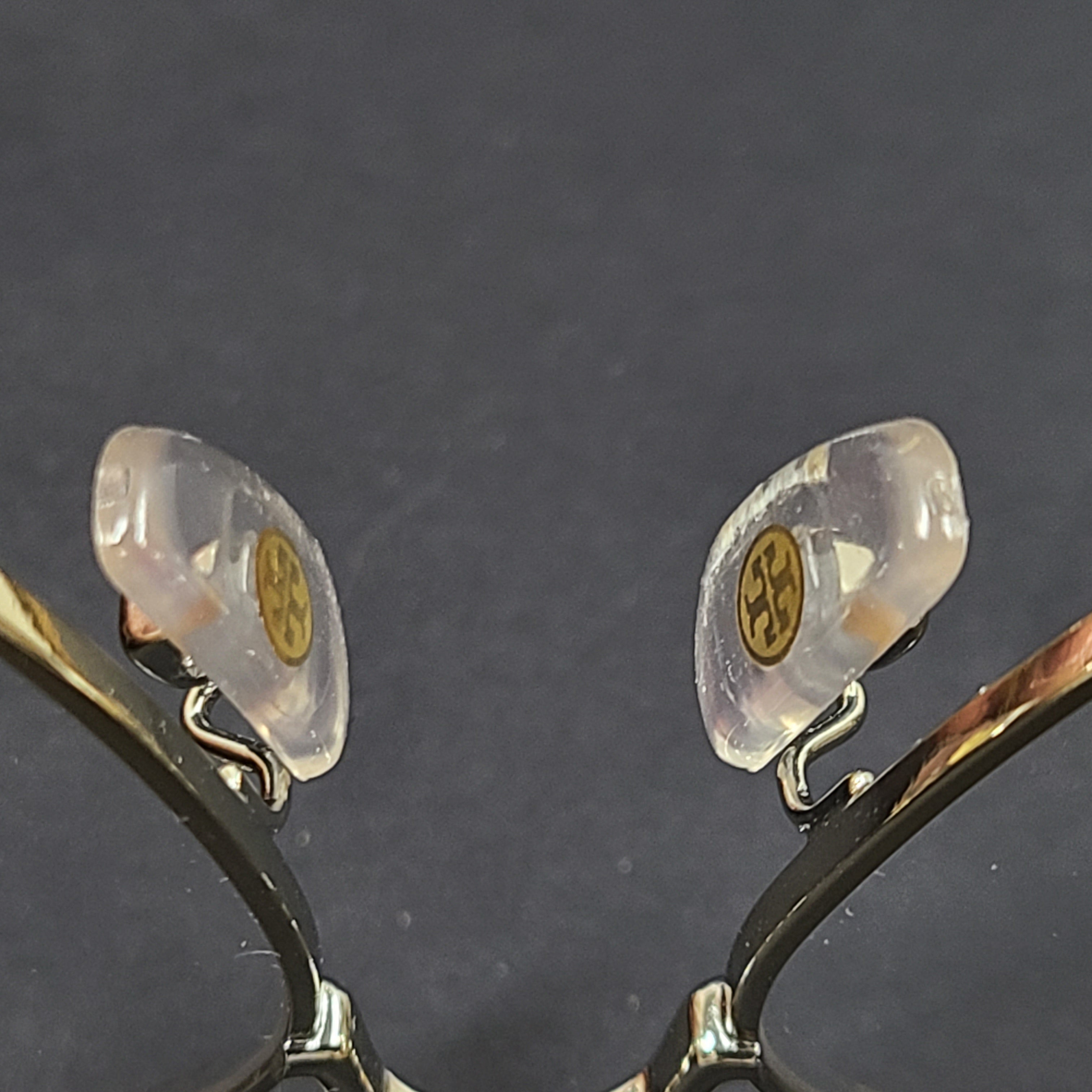 Tory Burch pilot-style metal-frame glasses in gold with 55mm eye size and branded temple detailing.