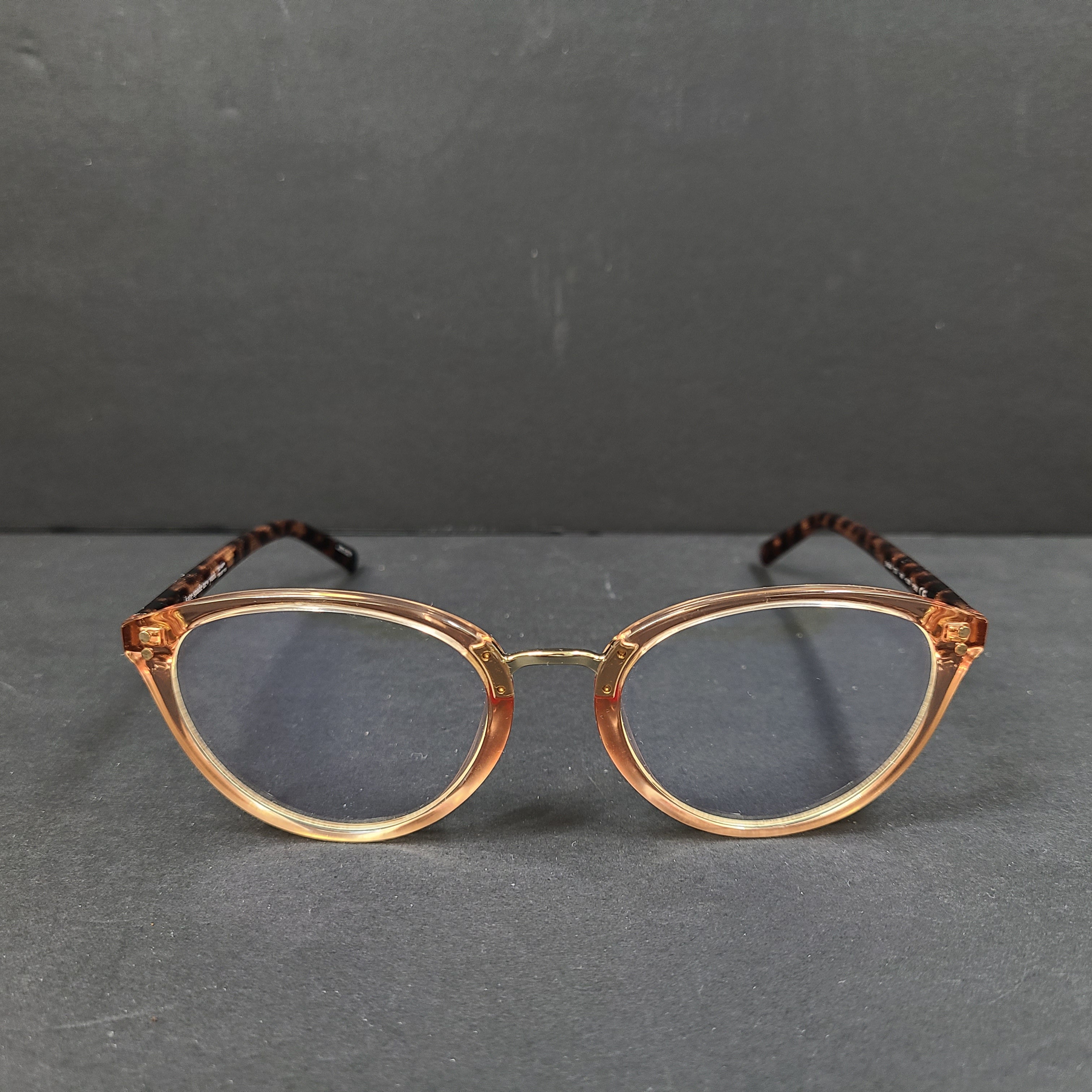 Kate Spade Emilia eyeglasses 2T3 140 in tortoise and peach with a branded arm inscription.