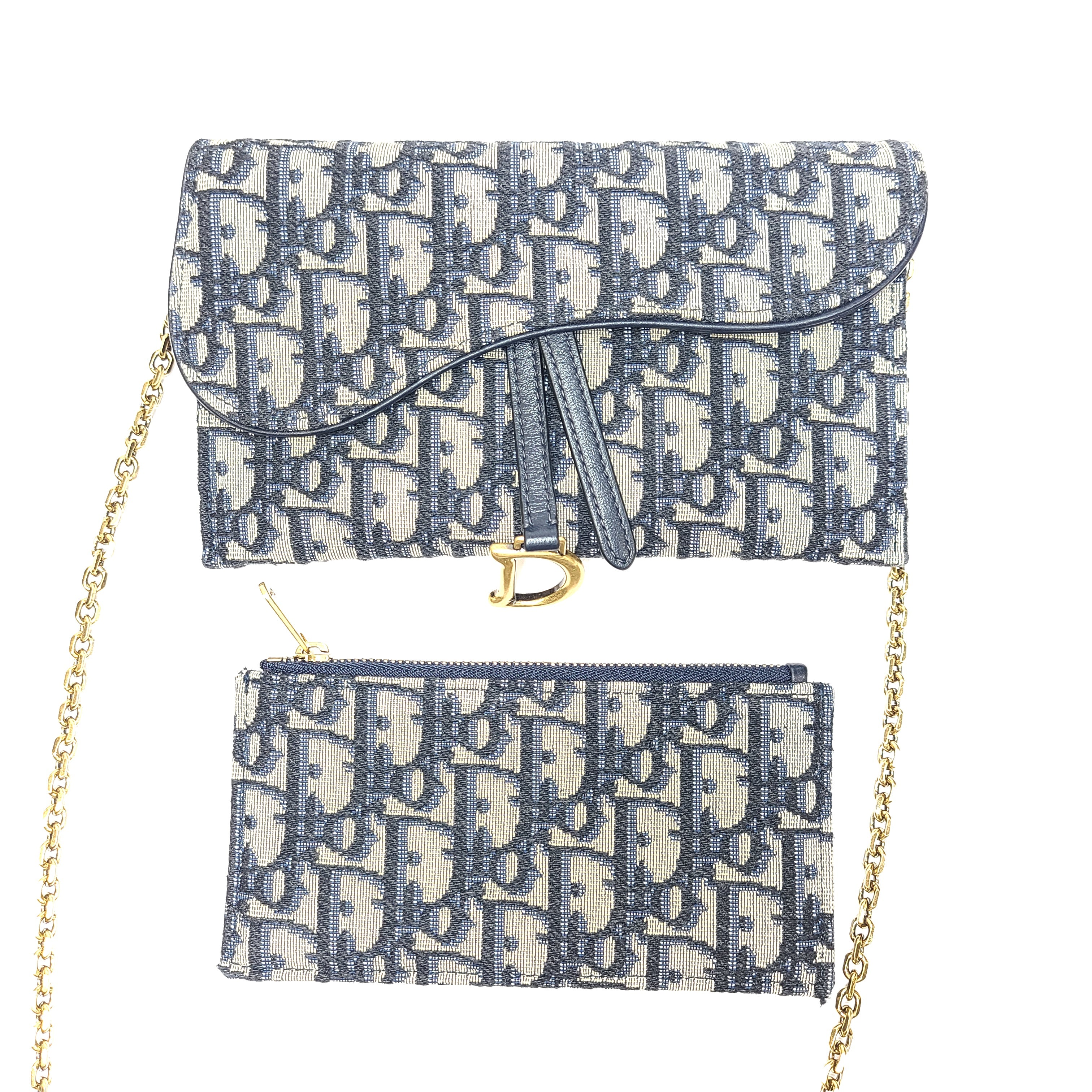 Christian Dior blue leather handbag with a gold chain strap and matching pouch.