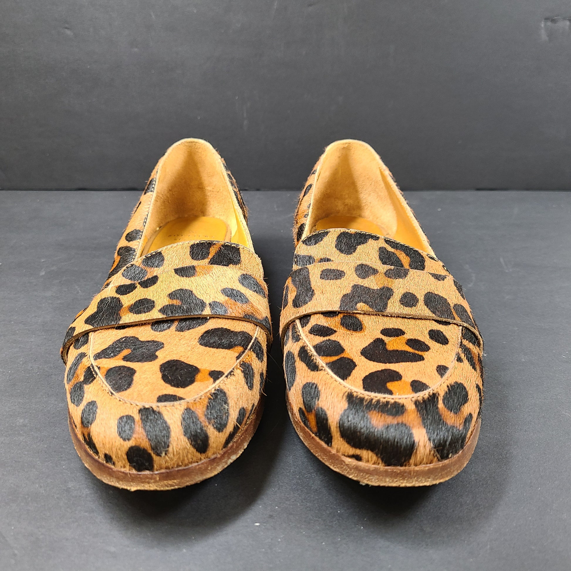 Leopard-print Sézane loafers feature a low profile, branded insole reading "SOULIERS SÉZANE" and a sole stamped "made in Portugal" and 39.