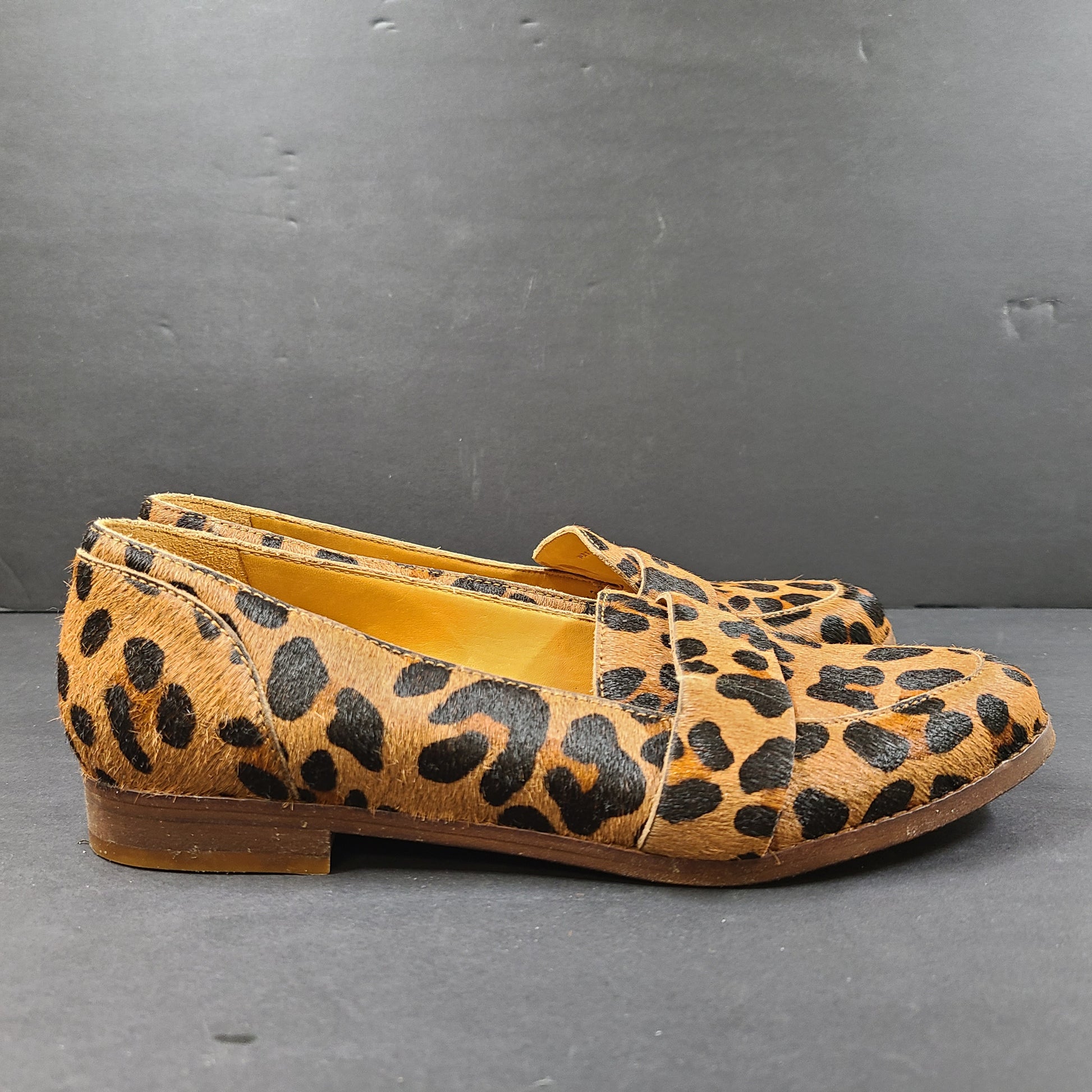 Leopard-print Sézane loafers feature a low profile, branded insole reading "SOULIERS SÉZANE" and a sole stamped "made in Portugal" and 39.