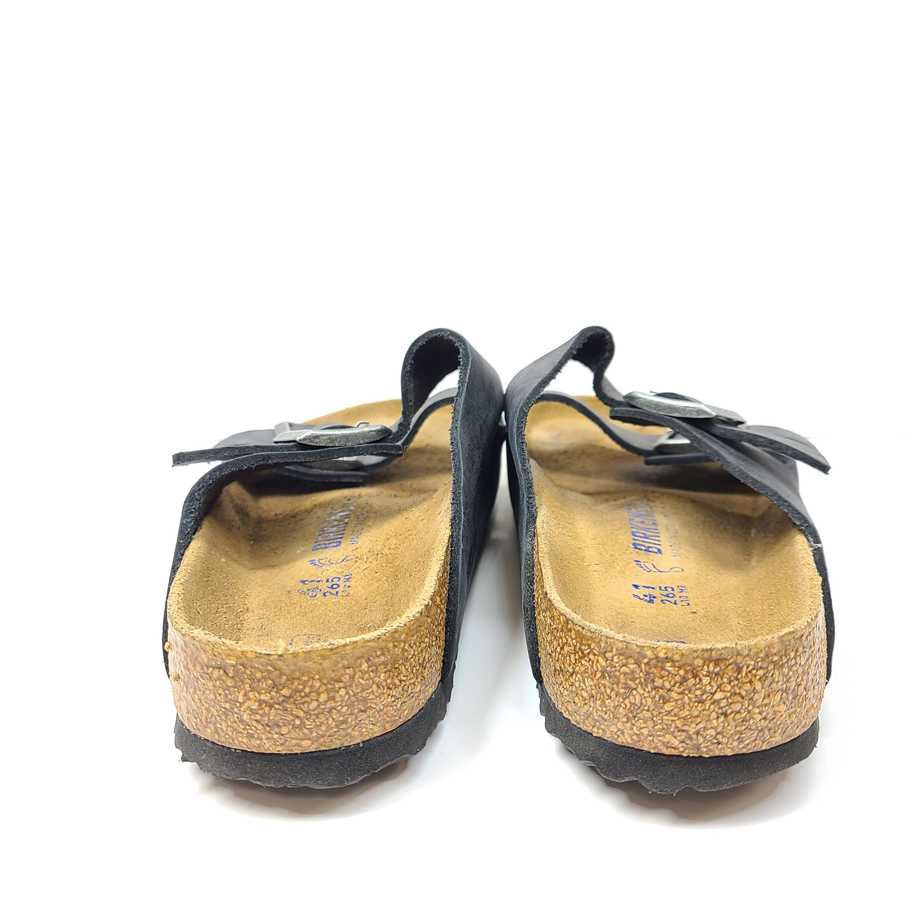 Birkenstock Arizona two-strap black sandals, size 41, with worn footbed and intact straps and soles.