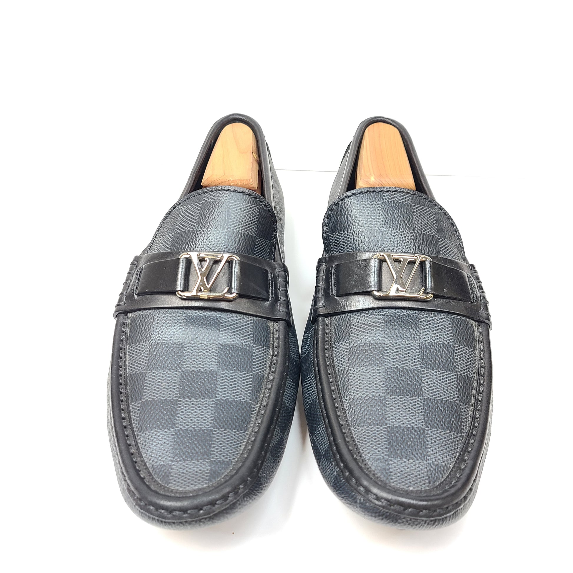 Black Louis Vuitton checkered-pattern shoes in size 8½ with matching dust bags for refined, all-day wear.