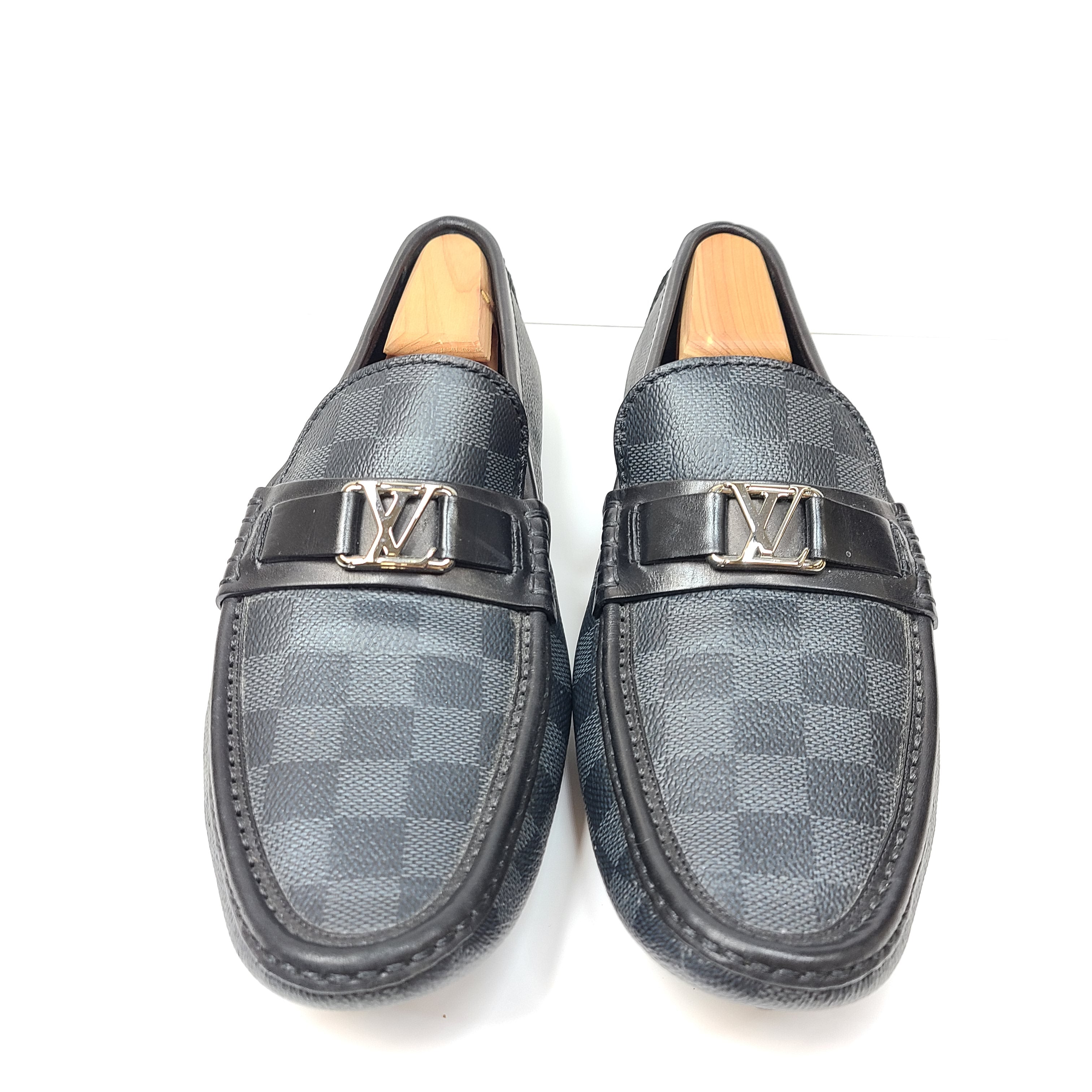 Black Louis Vuitton checkered-pattern shoes in size 8½ with matching dust bags for refined, all-day wear.