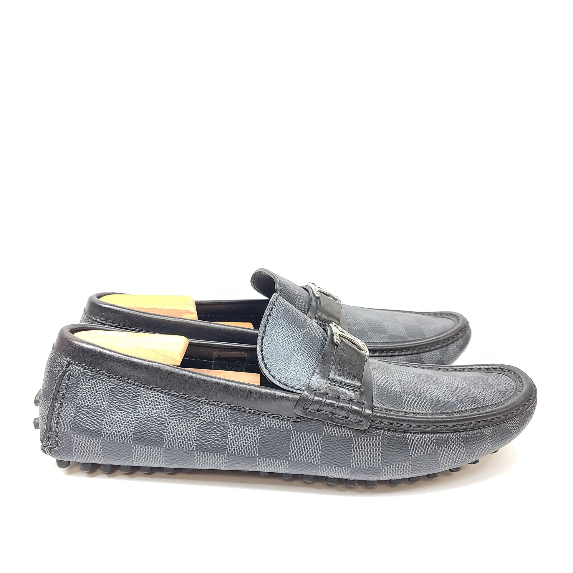 Black Louis Vuitton checkered-pattern shoes in size 8½ with matching dust bags for refined, all-day wear.