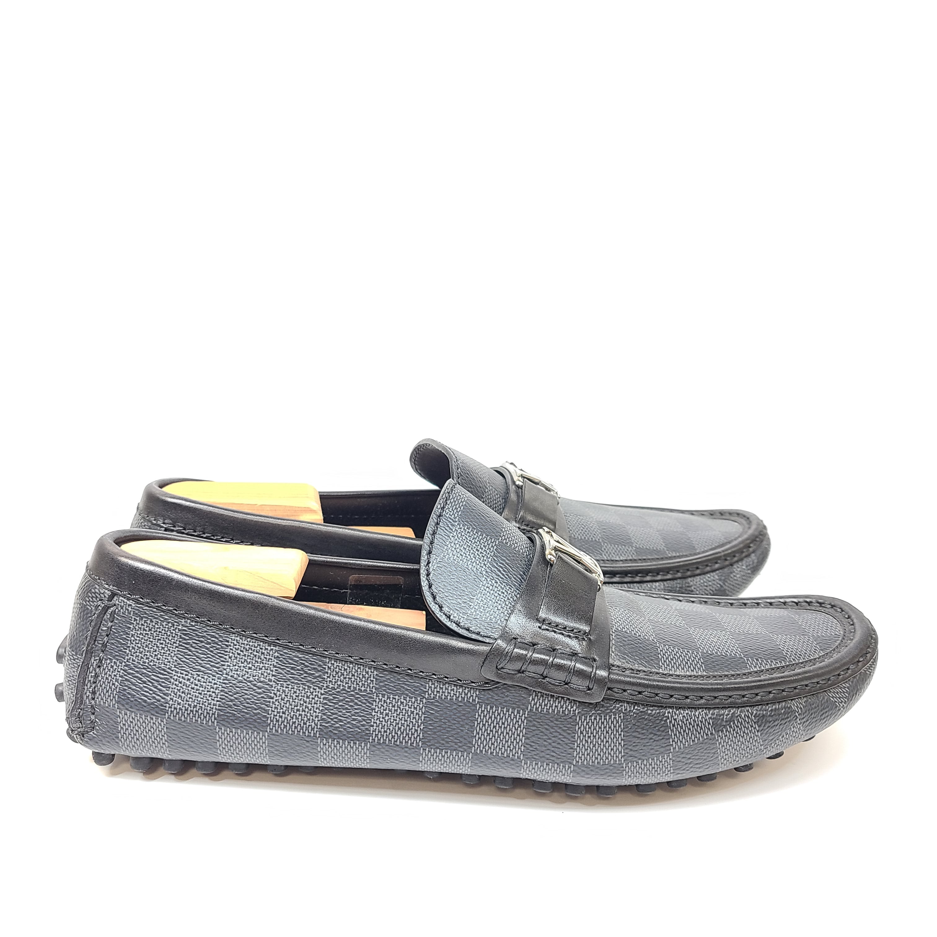 Black Louis Vuitton checkered-pattern shoes in size 8½ with matching dust bags for refined, all-day wear.