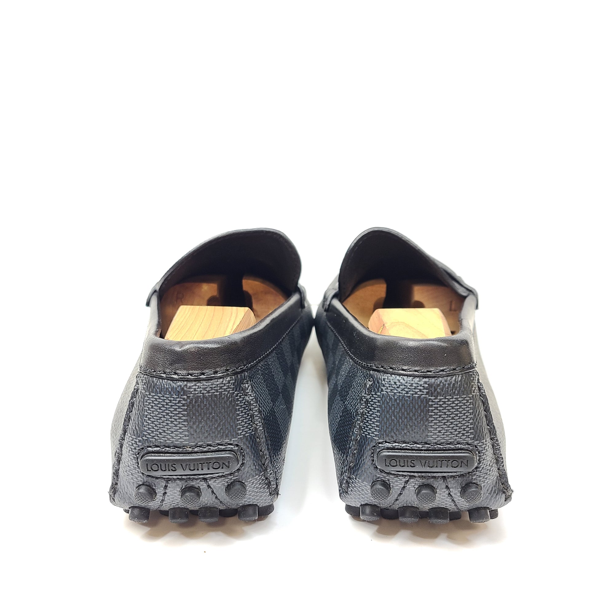 Black Louis Vuitton checkered-pattern shoes in size 8½ with matching dust bags for refined, all-day wear.
