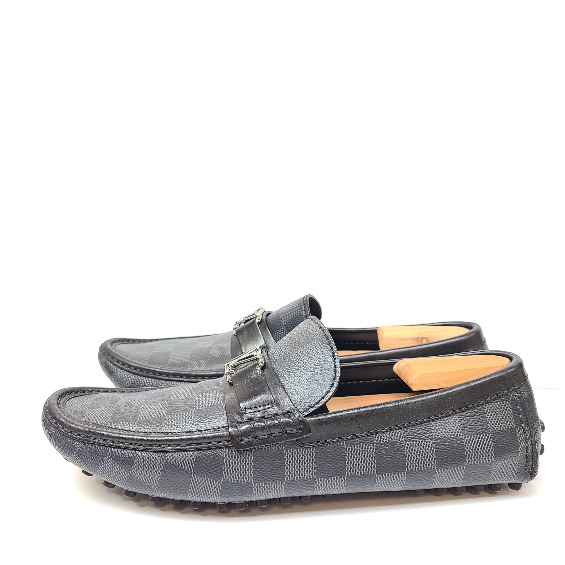 Black Louis Vuitton checkered-pattern shoes in size 8½ with matching dust bags for refined, all-day wear.