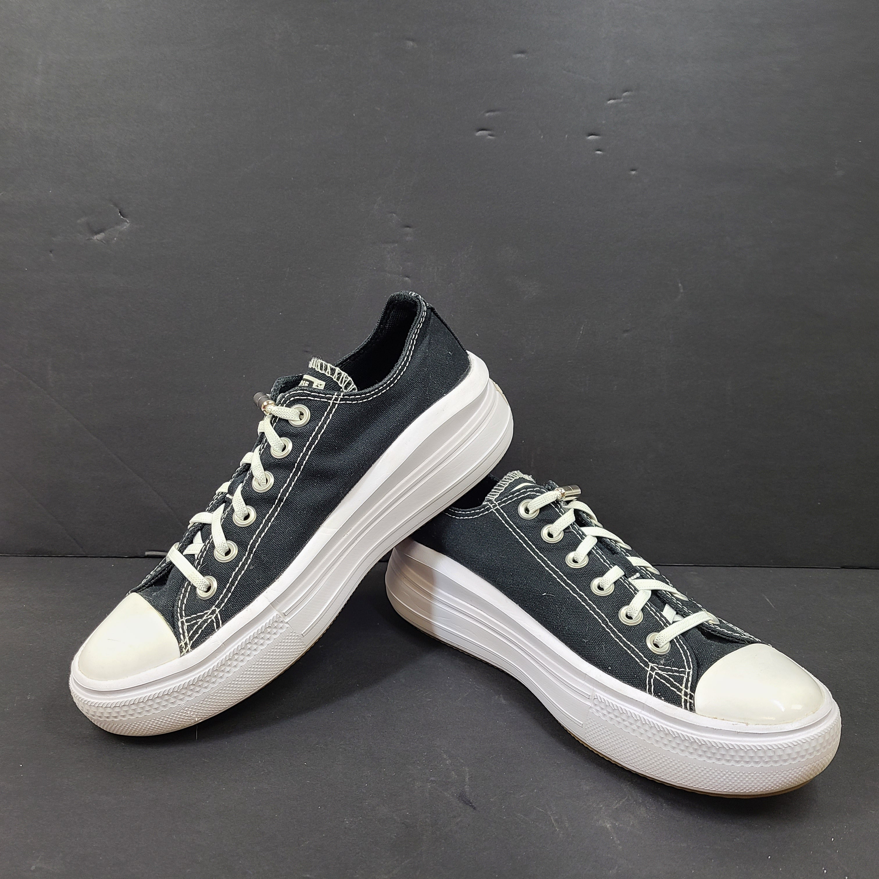 Black Converse Chuck Taylor All Star Move platform sneakers, size US 8.5, model 570256C.