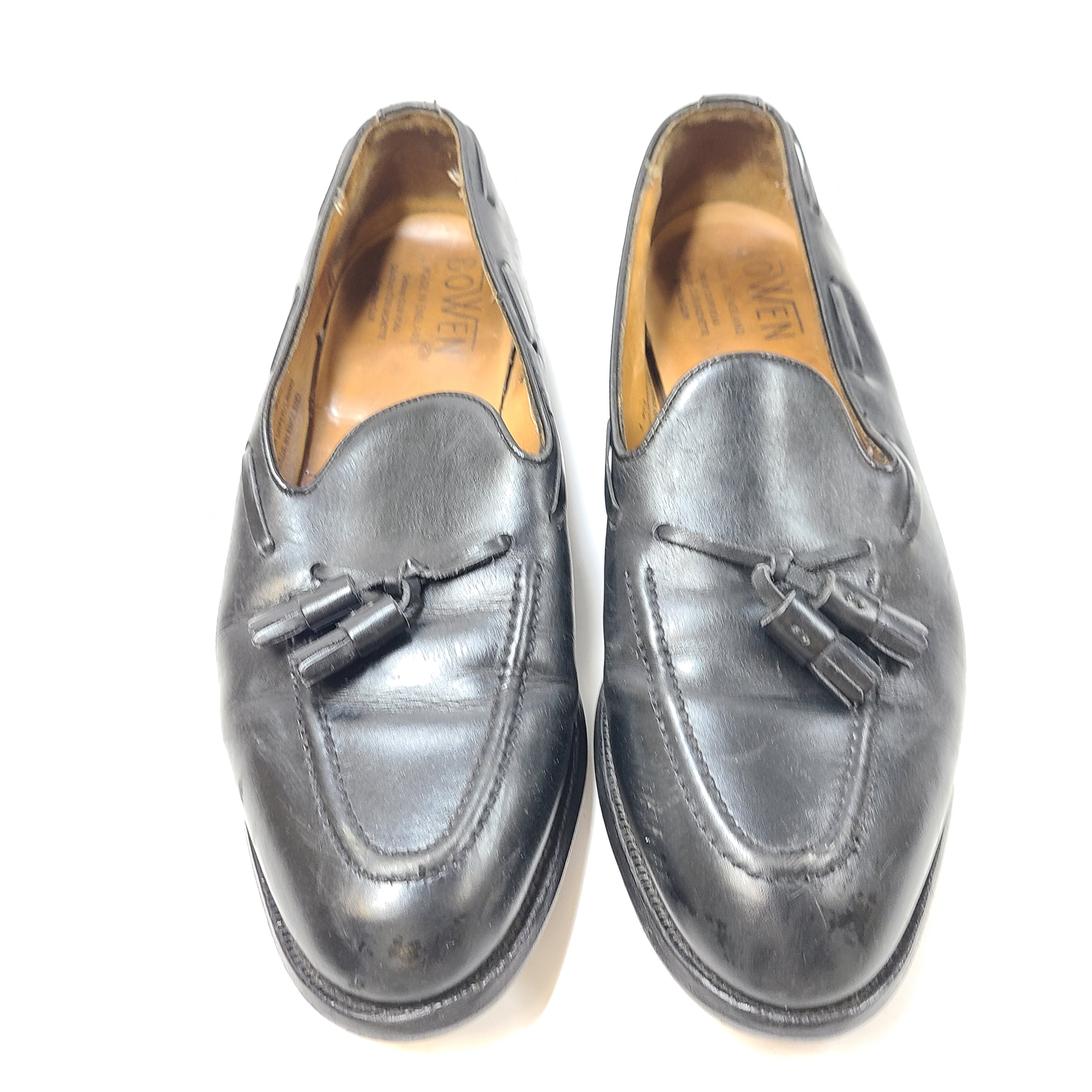Black leather Bowen men's loafers with classic slip-on silhouette and low heel.
