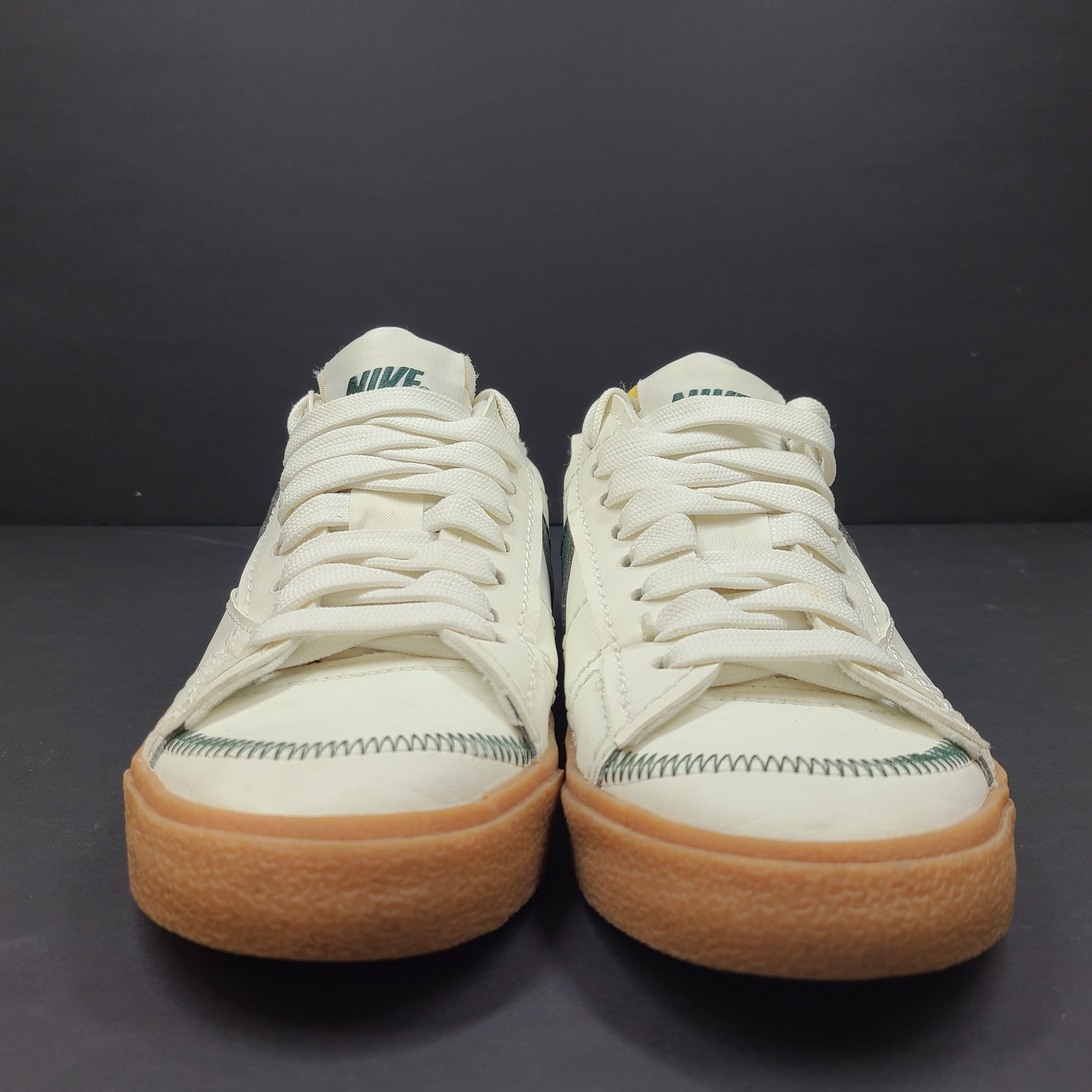 Nike Blazer Low '77 Jumbo in Off-White and Green with gum sole and oversized tongue.