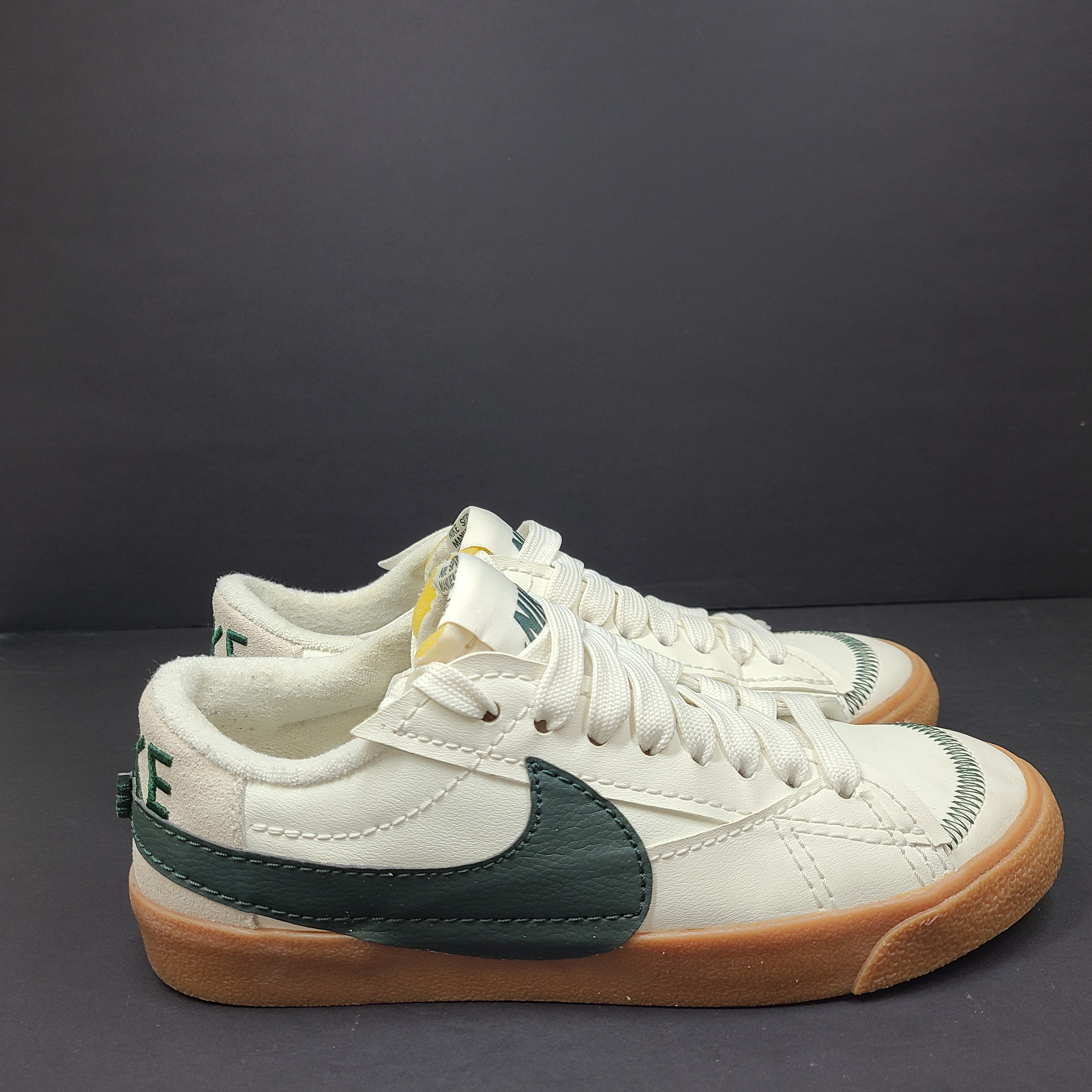 Nike Blazer Low '77 Jumbo in Off-White and Green with gum sole and oversized tongue.