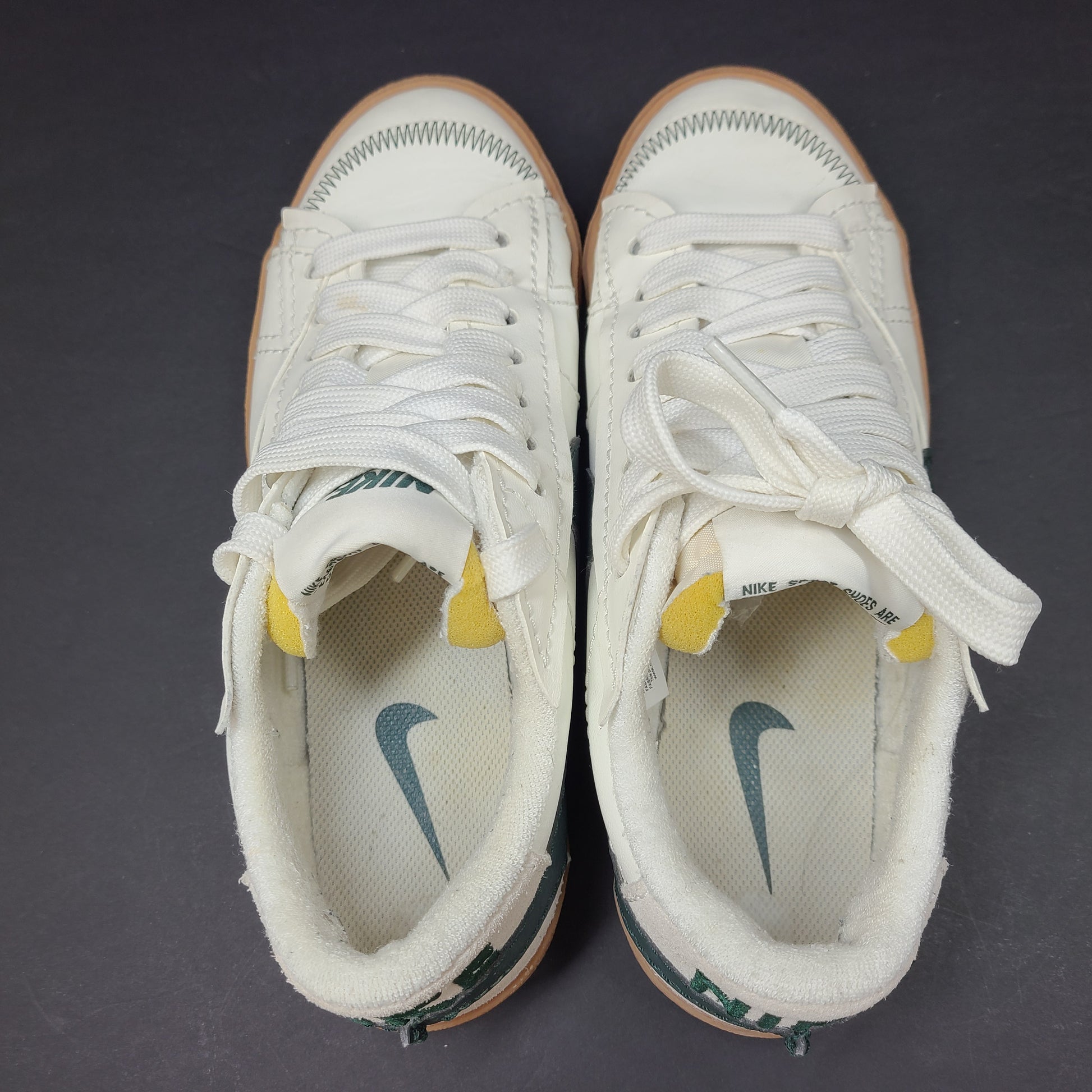 Nike Blazer Low '77 Jumbo in Off-White and Green with gum sole and oversized tongue.