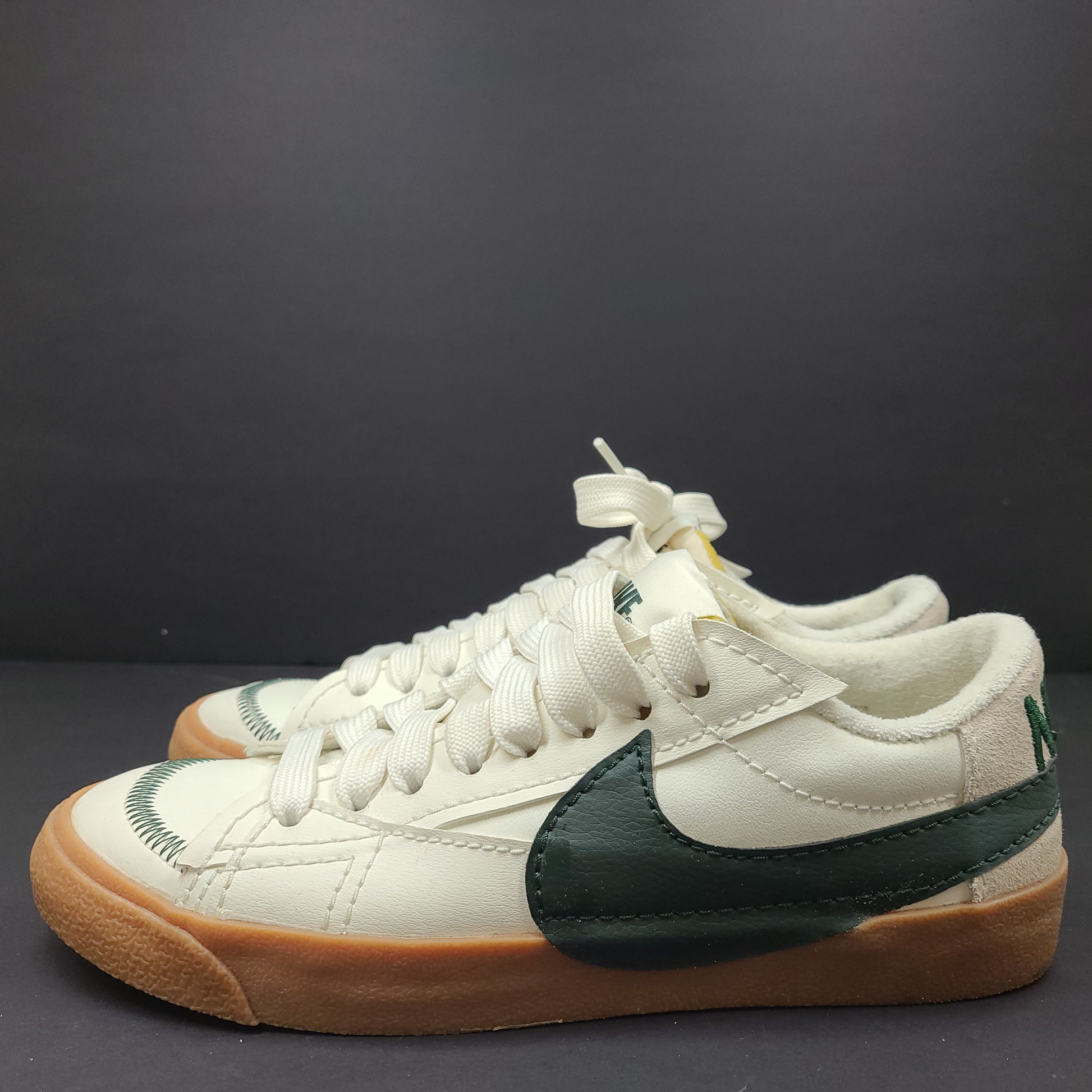 Nike Blazer Low '77 Jumbo in Off-White and Green with gum sole and oversized tongue.