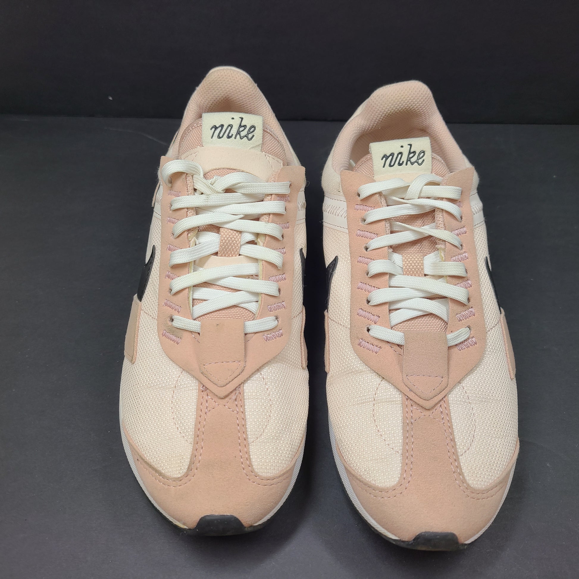 Nike Air Max Pre-Day women's sneaker in beige and black, size US 7.5, model DM8259-600, with wear on the soles.