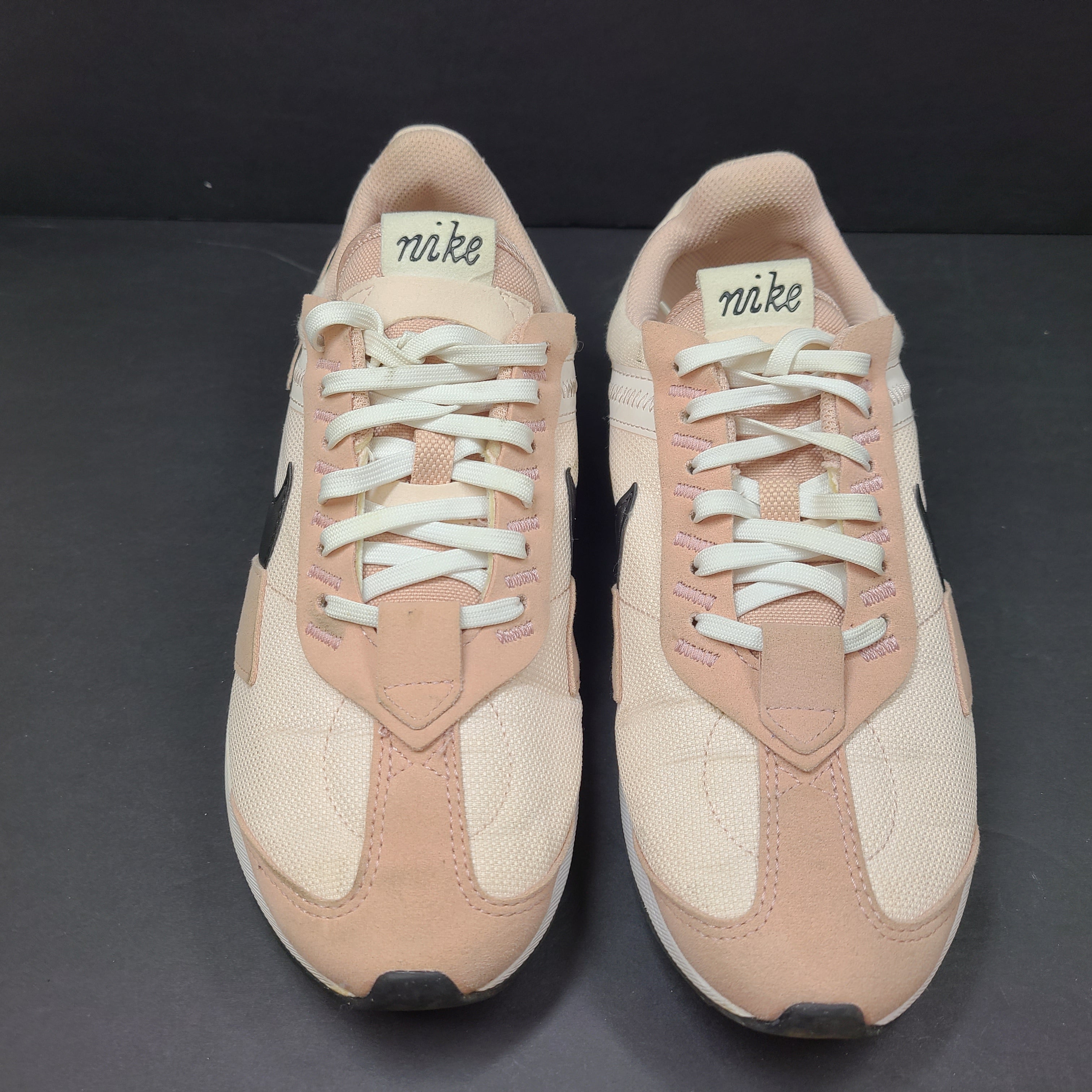 Nike Air Max Pre-Day women's sneaker in beige and black, size US 7.5, model DM8259-600, with wear on the soles.