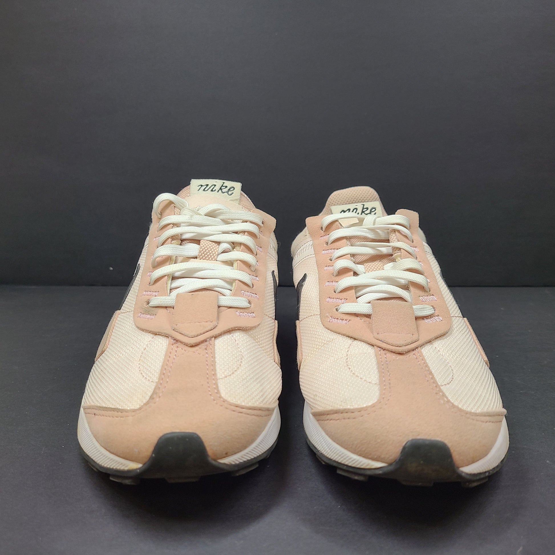 Nike Air Max Pre-Day women's sneaker in beige and black, size US 7.5, model DM8259-600, with wear on the soles.