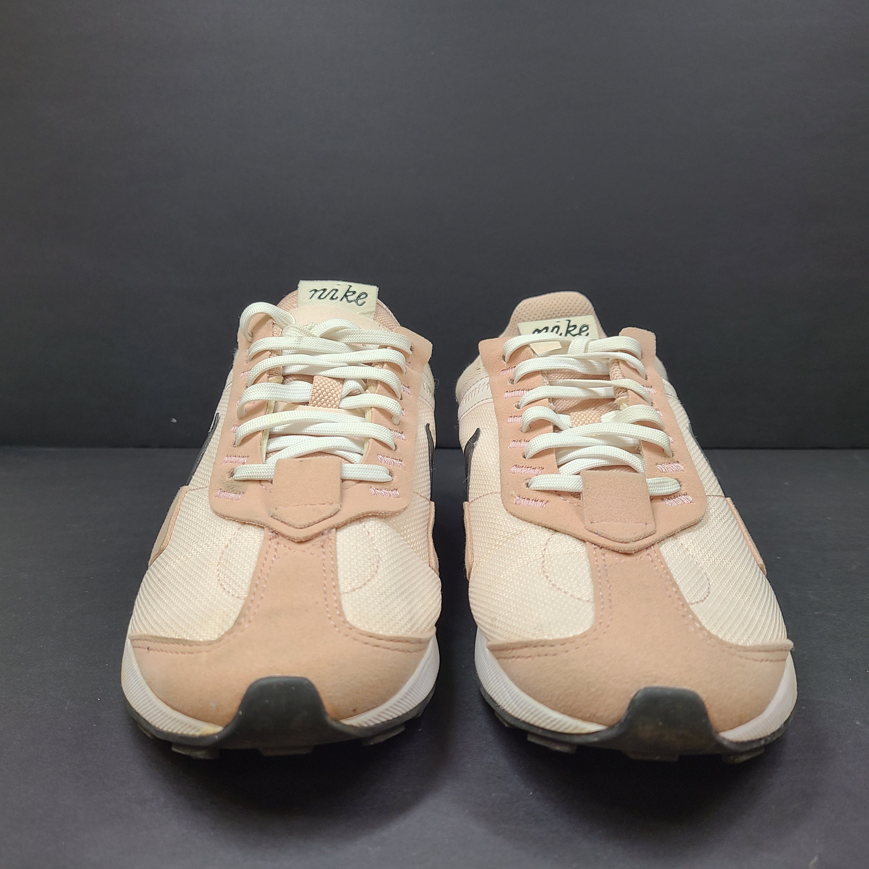 Nike Air Max Pre-Day women's sneaker in beige and black, size US 7.5, model DM8259-600, with wear on the soles.