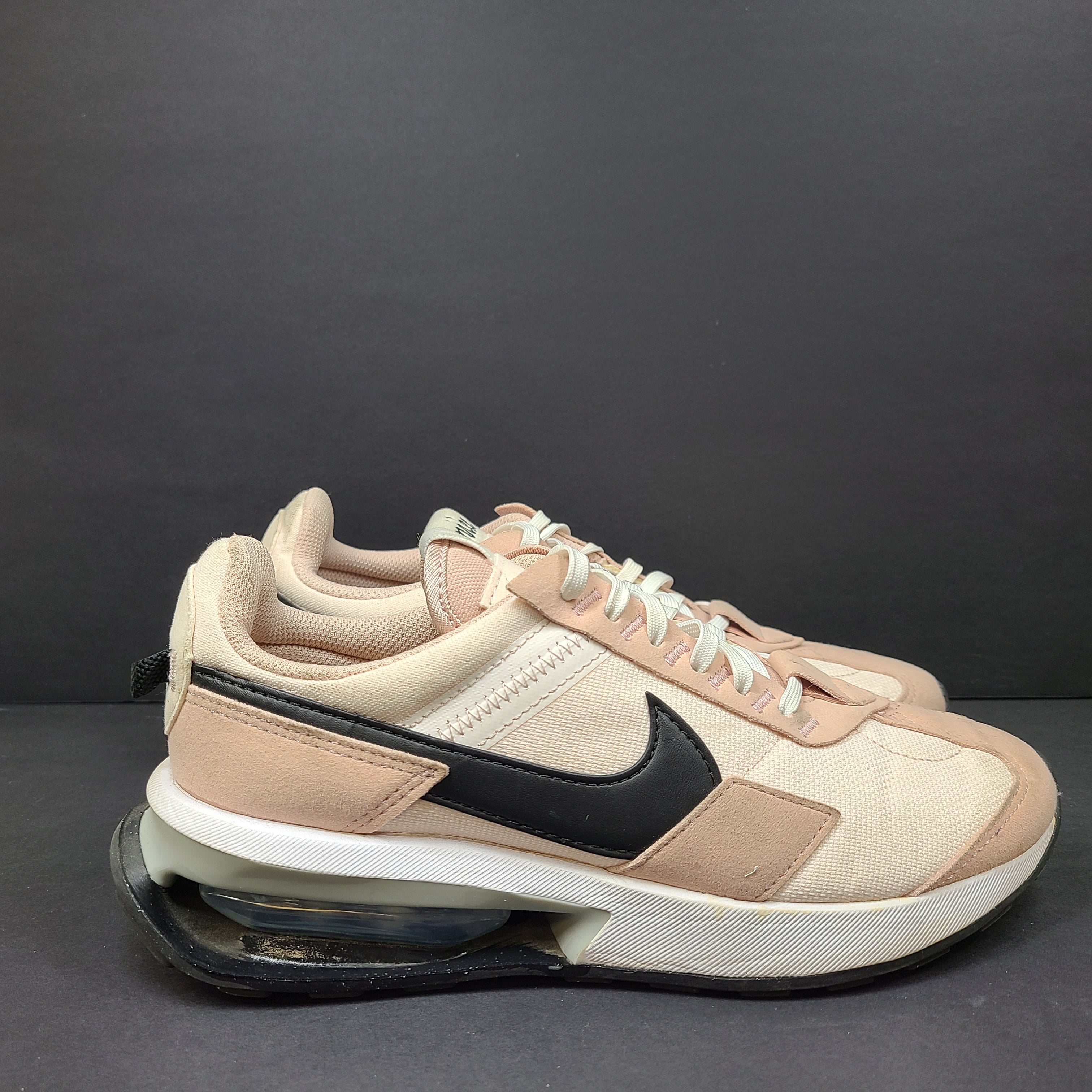 Nike Air Max Pre-Day women's sneaker in beige and black, size US 7.5, model DM8259-600, with wear on the soles.