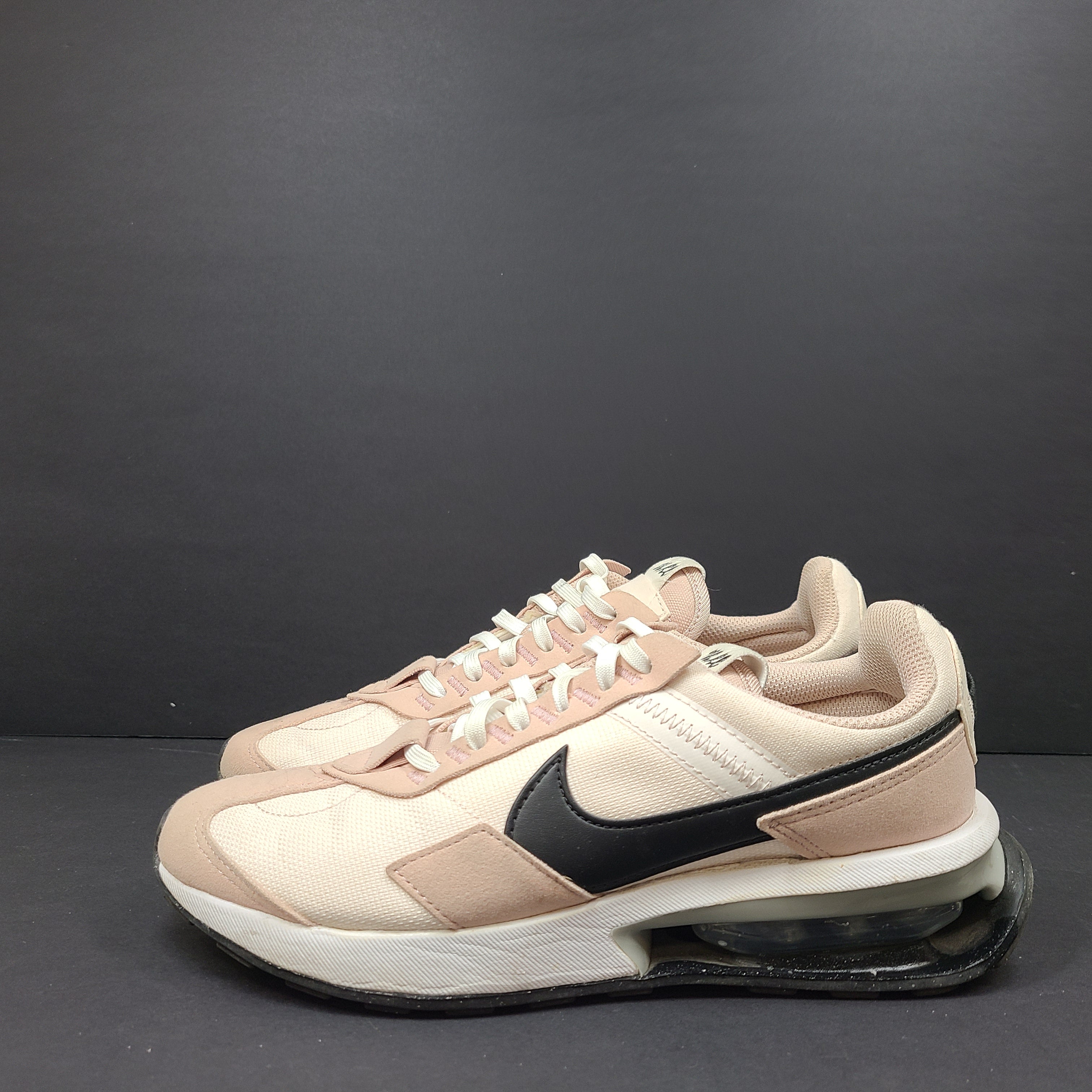 Nike Air Max Pre-Day women's sneaker in beige and black, size US 7.5, model DM8259-600, with wear on the soles.
