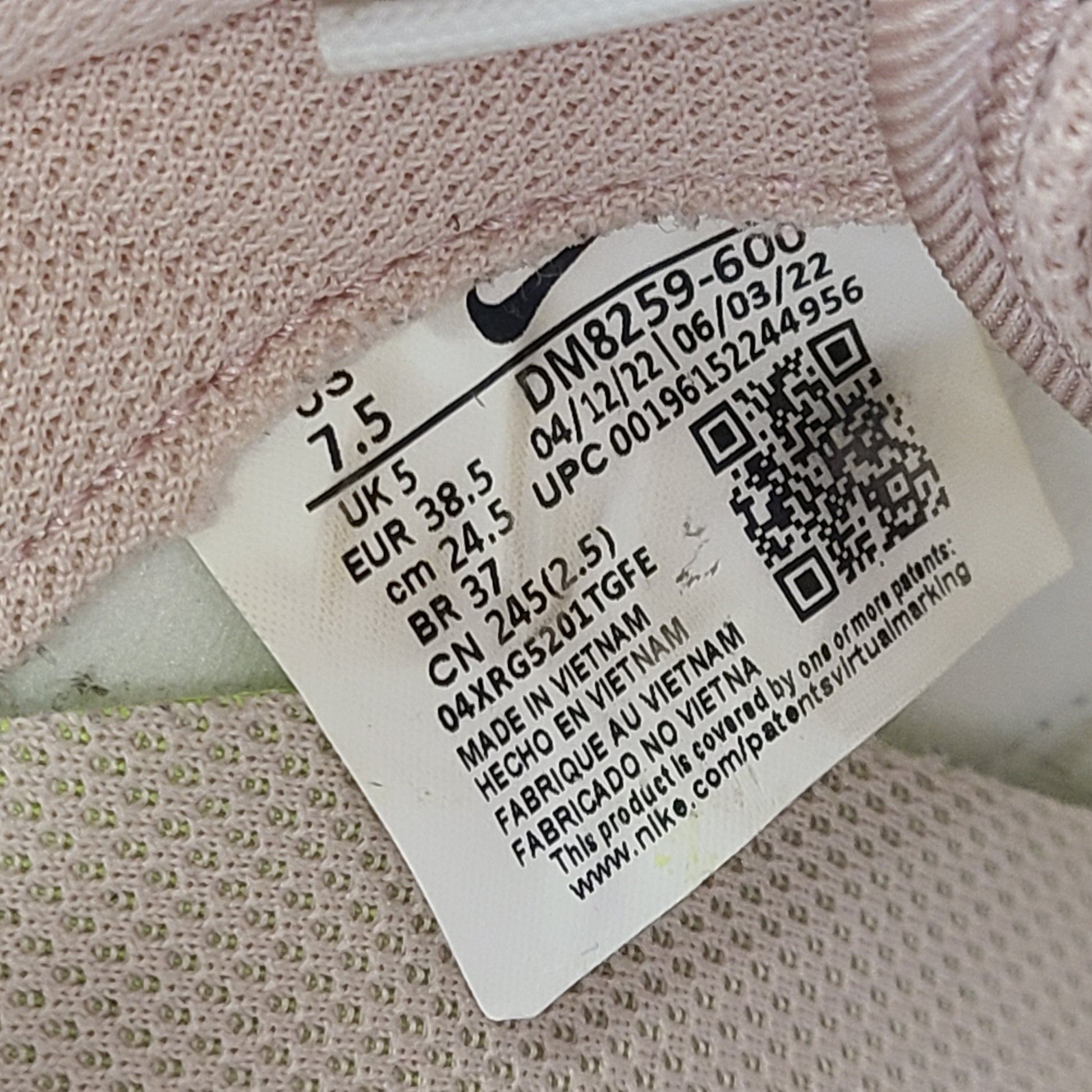 Nike Air Max Pre-Day women's sneaker in beige and black, size US 7.5, model DM8259-600, with wear on the soles.