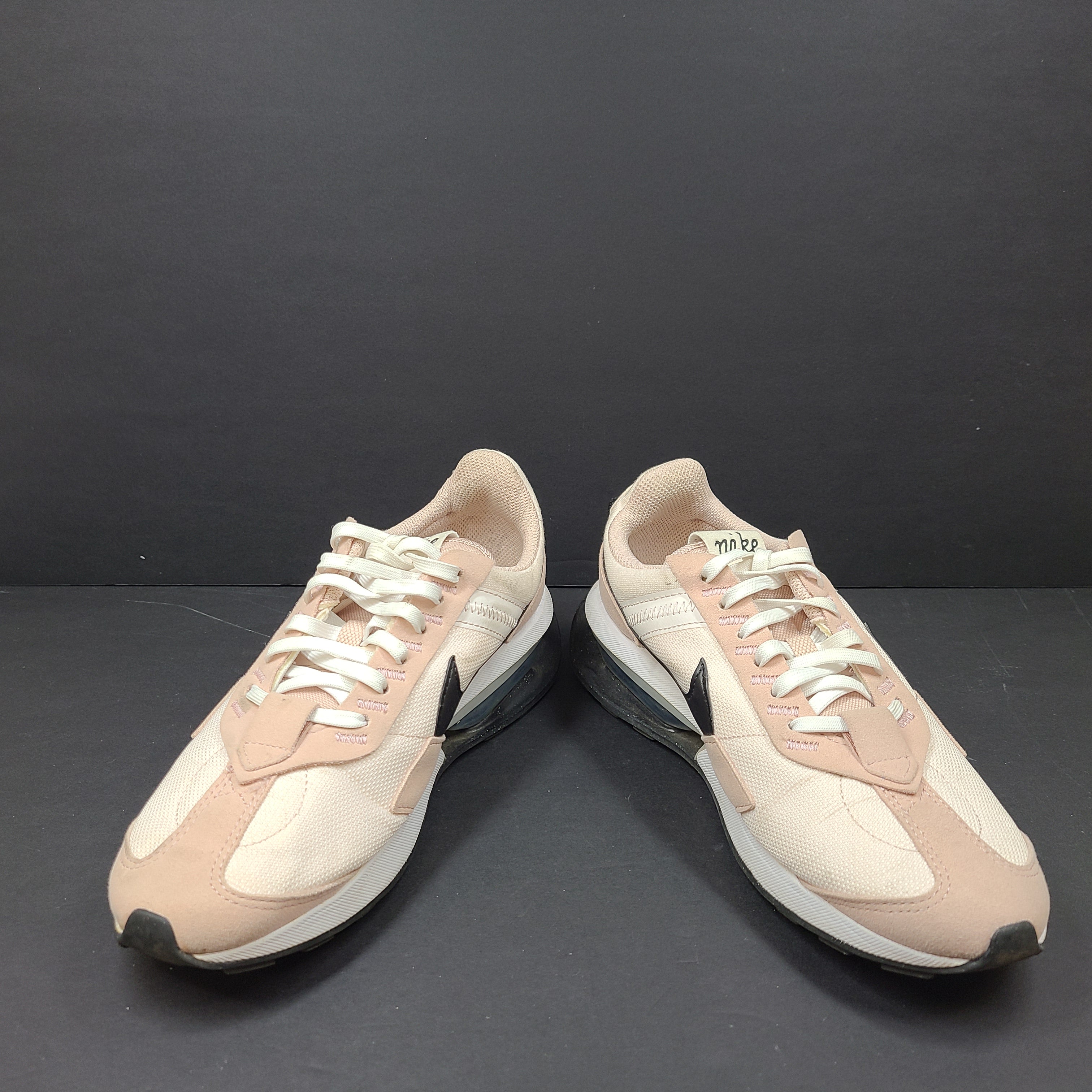 Nike Air Max Pre-Day women's sneaker in beige and black, size US 7.5, model DM8259-600, with wear on the soles.