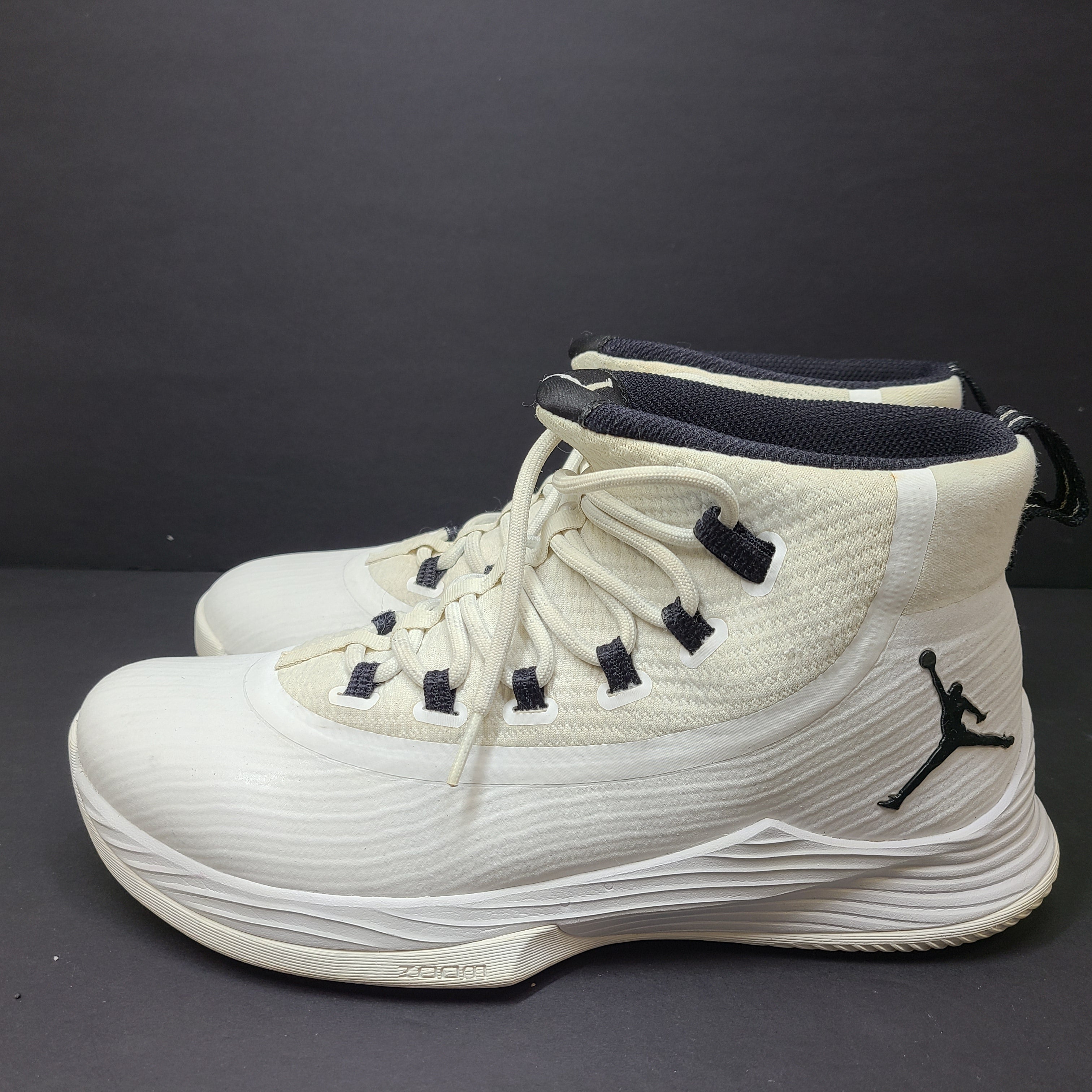 Jordan Ultra Fly 2 basketball shoes in white and black, US size 10, engineered for court performance and agility.