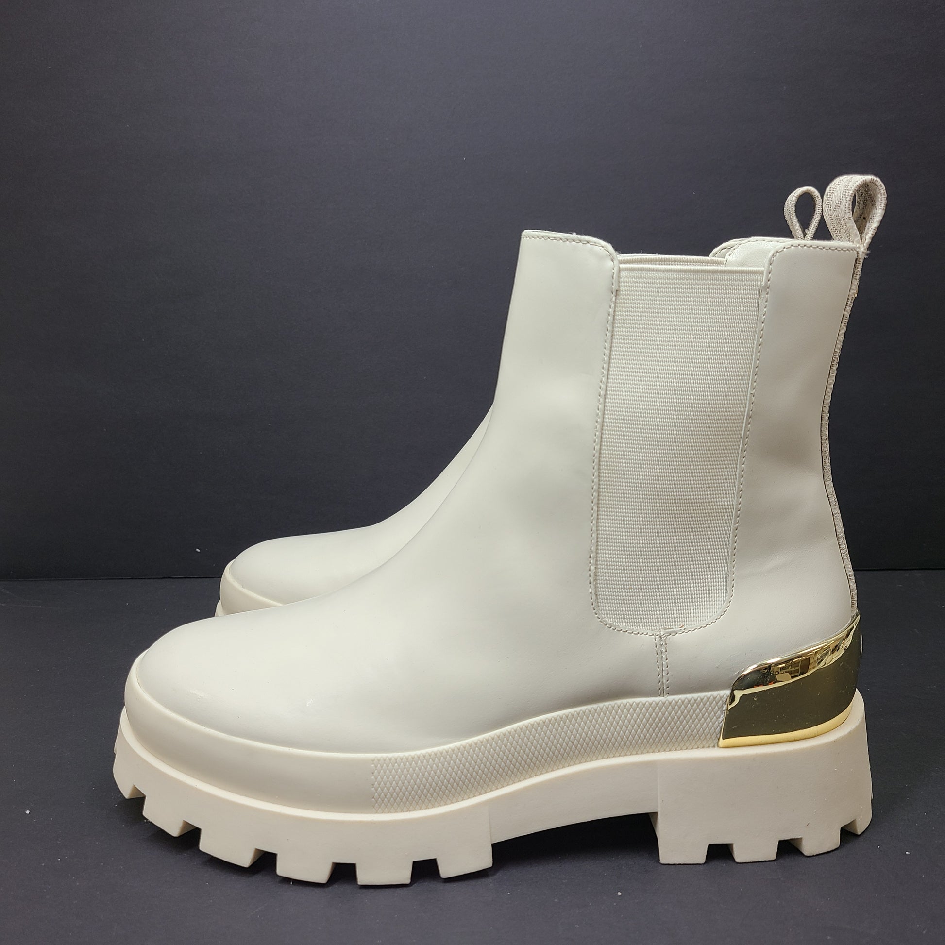 Michael Kors ivory boots size 8M in new, unused condition.